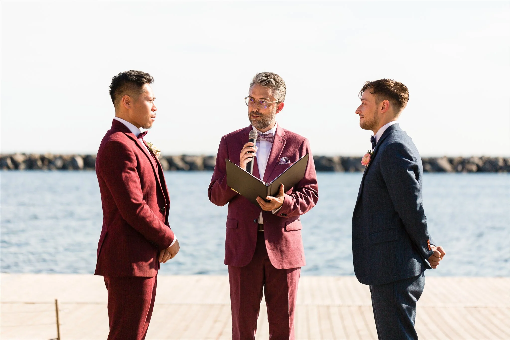 Michael and Jacob’s unforgettable wedding at The Henley Room in Toronto was a vibrant celebration of love and community. Planned by @stori.events, the day featured stunning florals by @theflower597toronto, incredible performances by drag queens Fay S