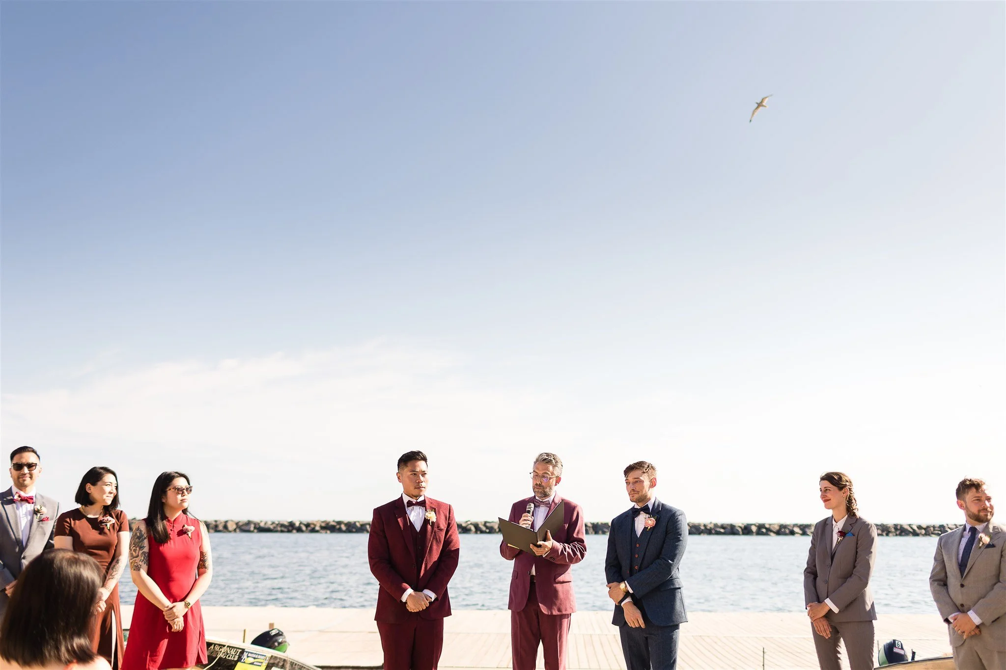 Michael and Jacob’s unforgettable wedding at The Henley Room in Toronto was a vibrant celebration of love and community. Planned by @stori.events, the day featured stunning florals by @theflower597toronto, incredible performances by drag queens Fay S