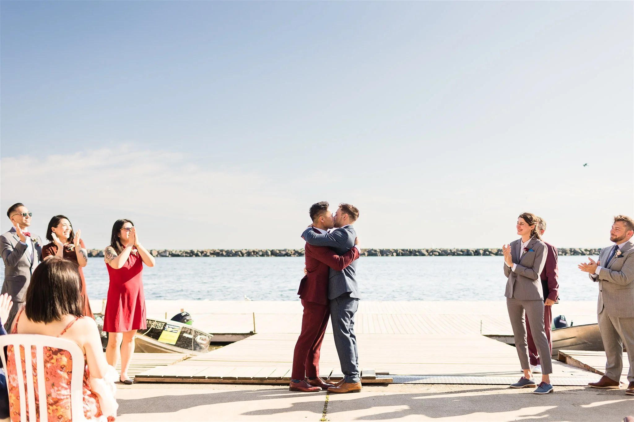 Michael and Jacob’s unforgettable wedding at The Henley Room in Toronto was a vibrant celebration of love and community. Planned by @stori.events, the day featured stunning florals by @theflower597toronto, incredible performances by drag queens Fay S