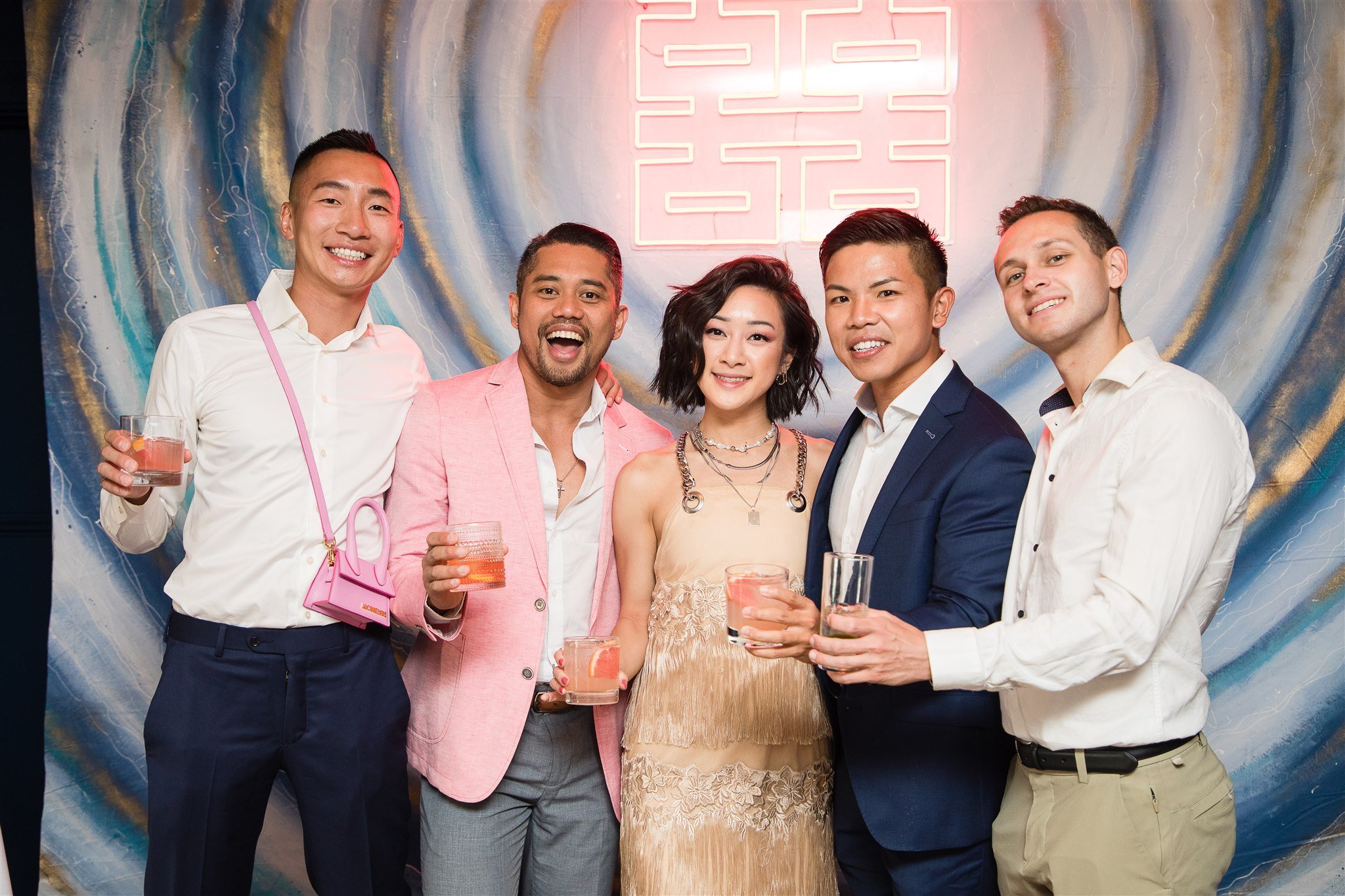 Michael and Jacob’s unforgettable wedding at The Henley Room in Toronto was a vibrant celebration of love and community. Planned by @stori.events, the day featured stunning florals by @theflower597toronto, incredible performances by drag queens Fay S