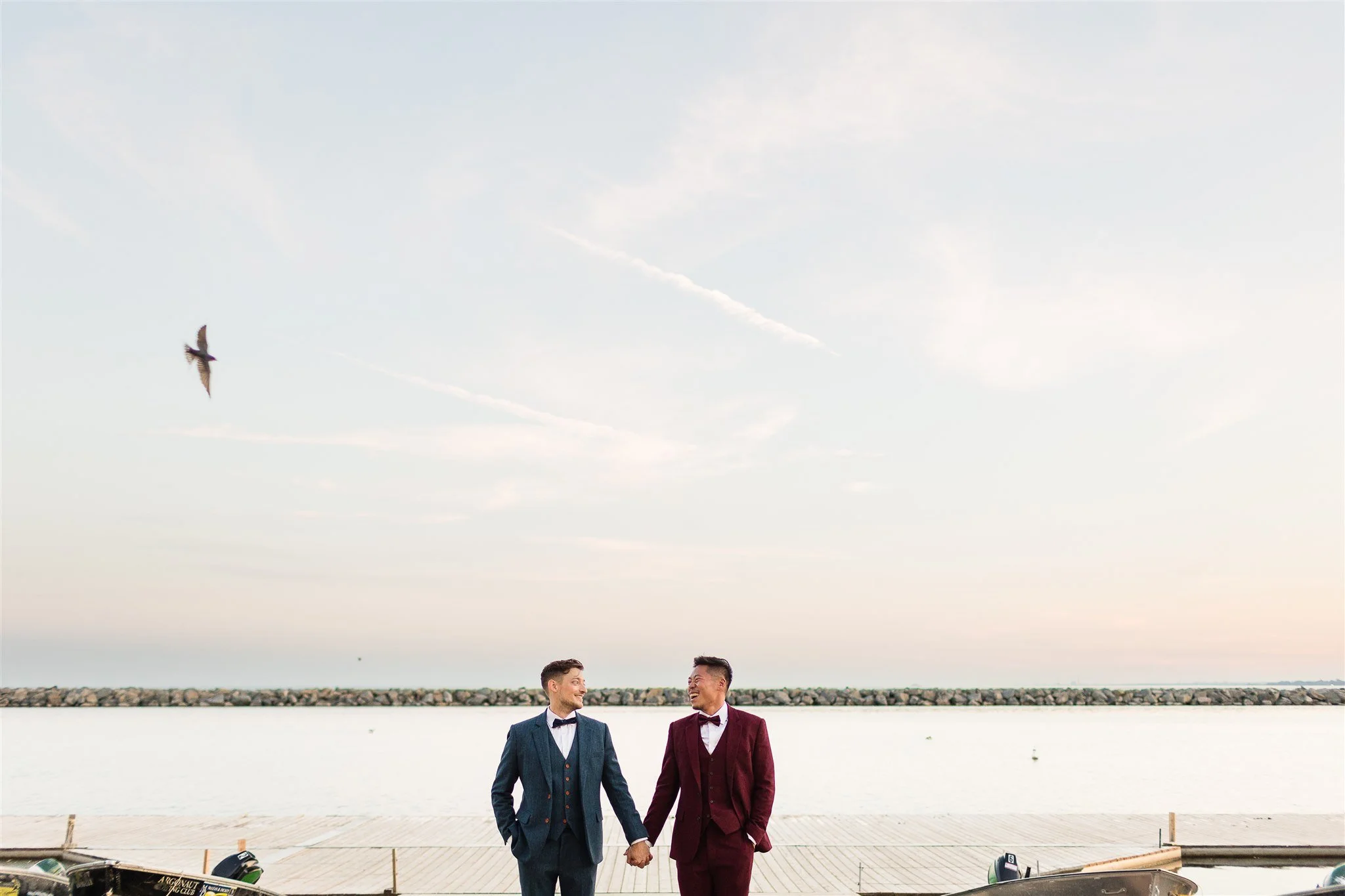 Michael and Jacob’s unforgettable wedding at The Henley Room in Toronto was a vibrant celebration of love and community. Planned by @stori.events, the day featured stunning florals by @theflower597toronto, incredible performances by drag queens Fay S