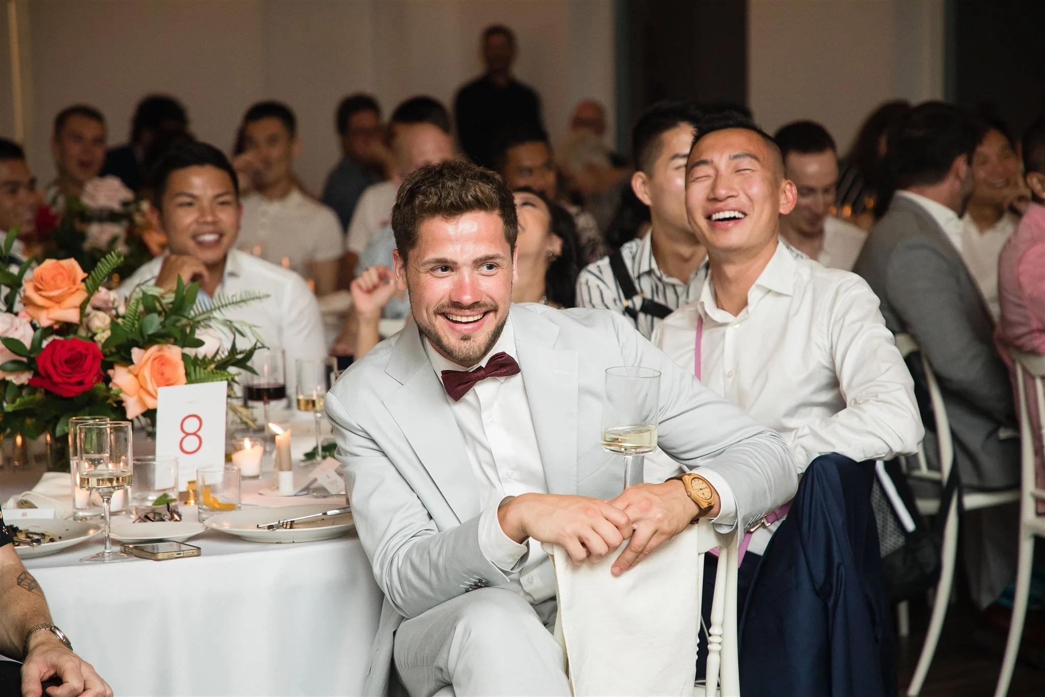 Michael and Jacob’s unforgettable wedding at The Henley Room in Toronto was a vibrant celebration of love and community. Planned by @stori.events, the day featured stunning florals by @theflower597toronto, incredible performances by drag queens Fay S