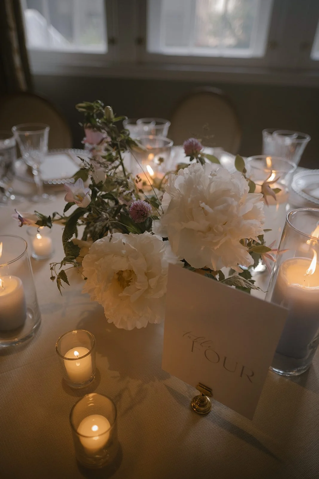 Andrea and Damian’s elegant wedding at The Ritz-Carlton Montreal was flawlessly planned by @stori.events and team. Captured by @kristina.bastien, the day featured stunning details, beautiful styling, and expert hair and makeup by @vanessaintrevado An