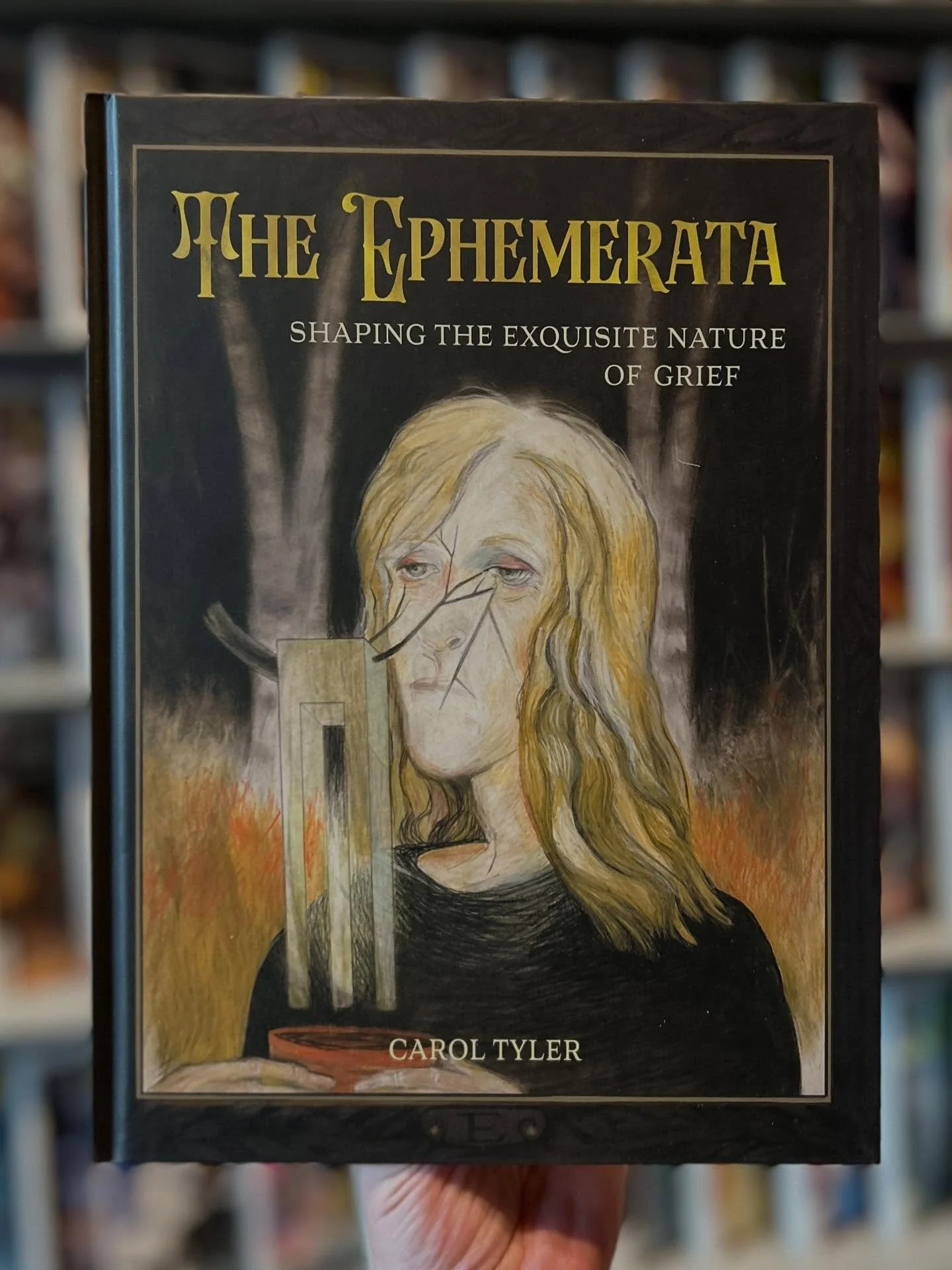 Ephemerata: Shaping The Exquisite Nature Of Grief is available now at the shop, and our web-store. 

Drawing upon her own bereavement, renowned comics artist and writer Carol Tyler emerges from a decade long period of grief to create an allegorical m