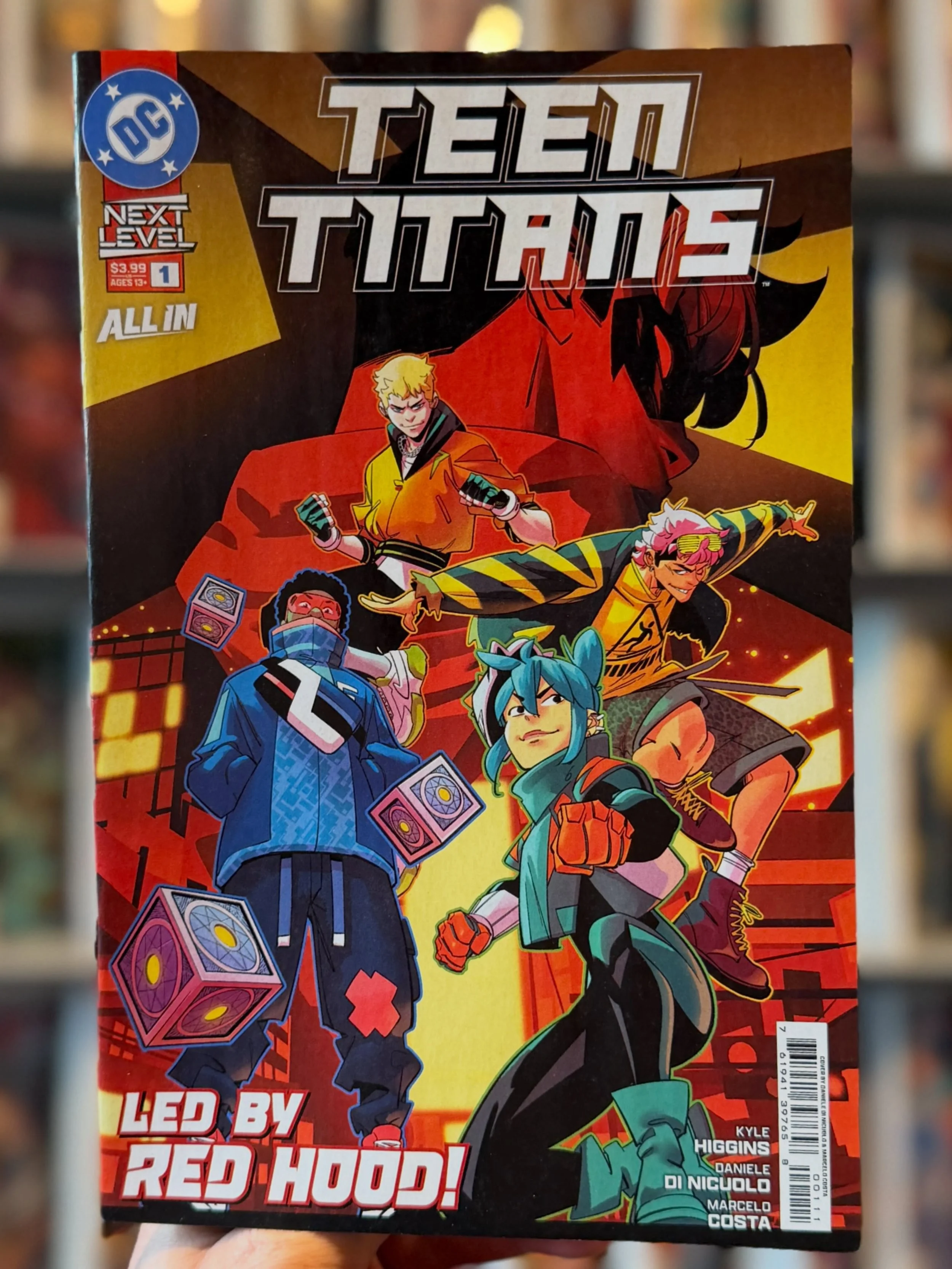 Teen Titans № 1 is available now at the shop, and our web-store. 

When one of their own vanishes after attending a rally for Ascend&mdash;a fast-growing youth movement training kids to survive in a world shaped by superhuman conflict&mdash;Fairplay,