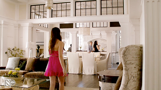 Neutral color scheme while the main character is wearing a vivid pink dress.