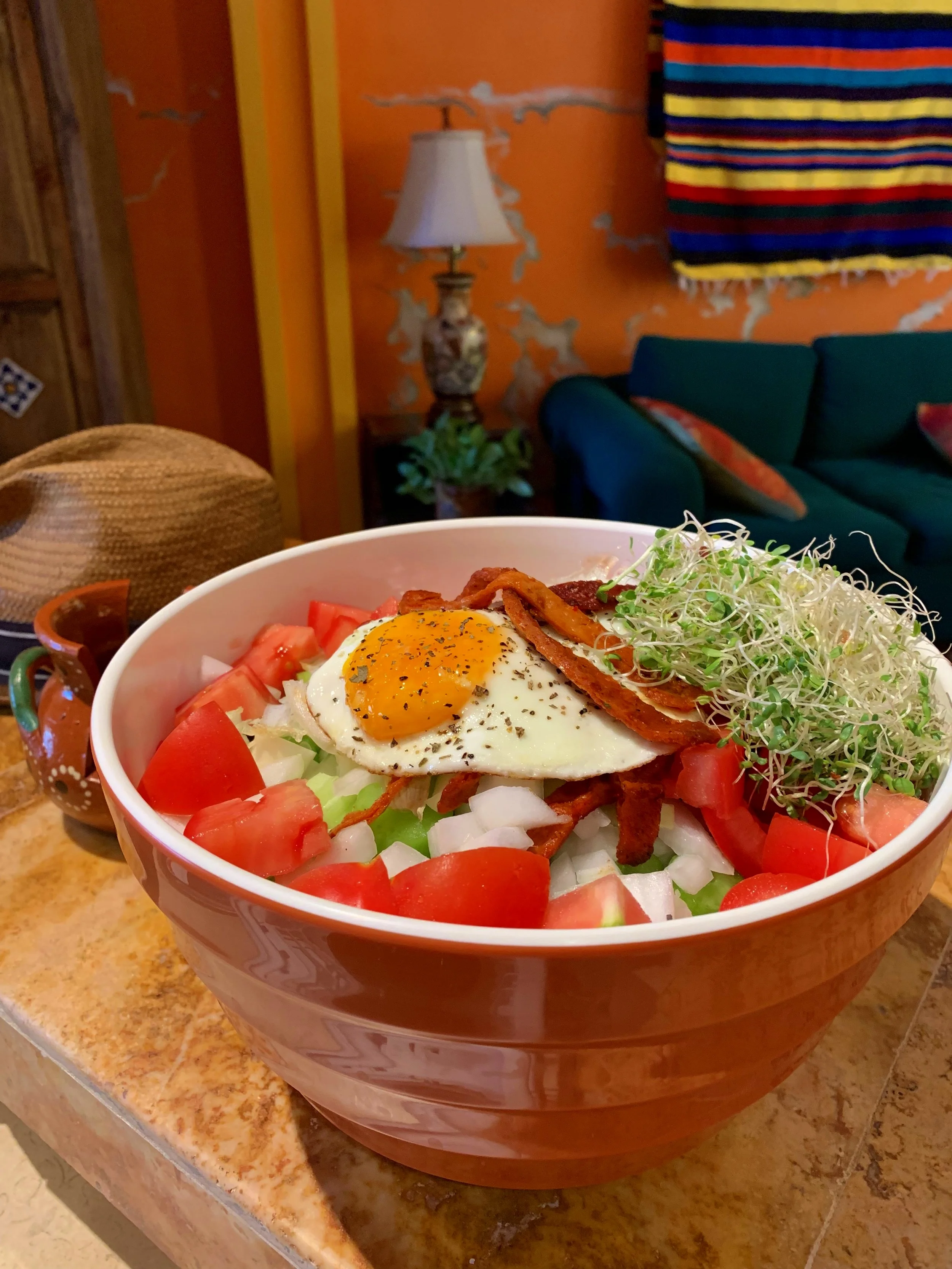 The infamous Dragon Bowl Salad made it’s debut in Mexico w/ a delicious fried egg & veggie carne asada topping!