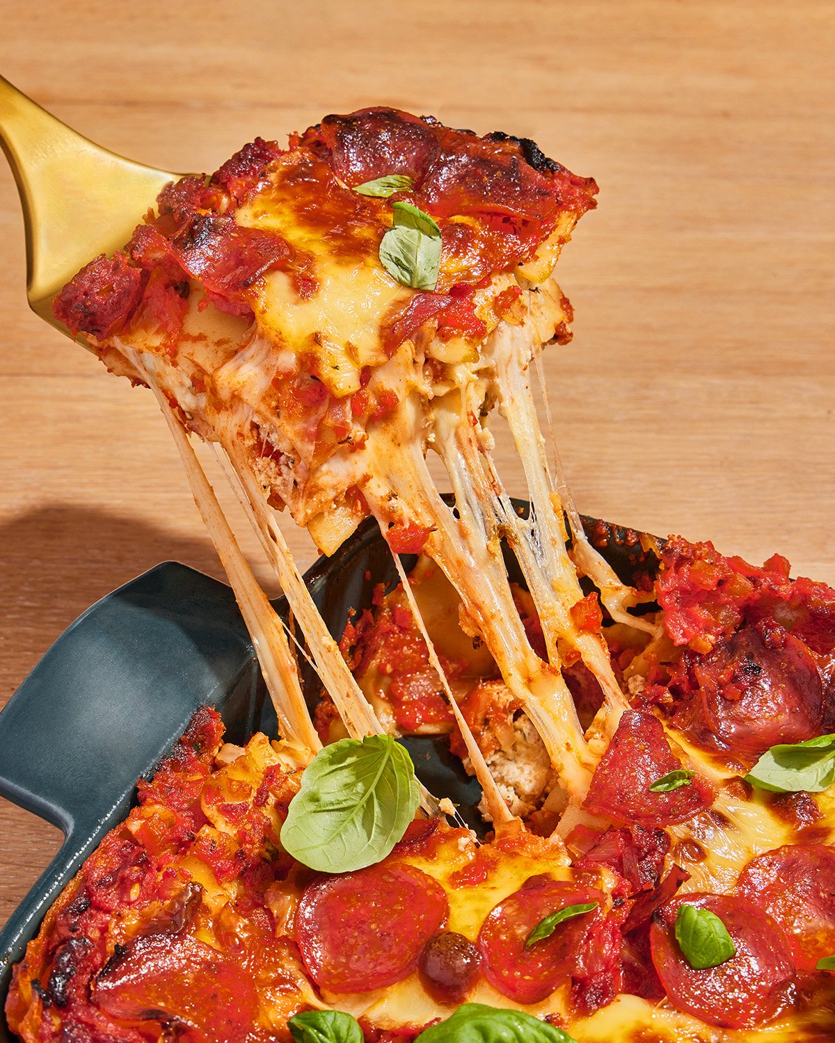 Pepperoni Pizza Lasagna_cheese pull_4x5.jpg