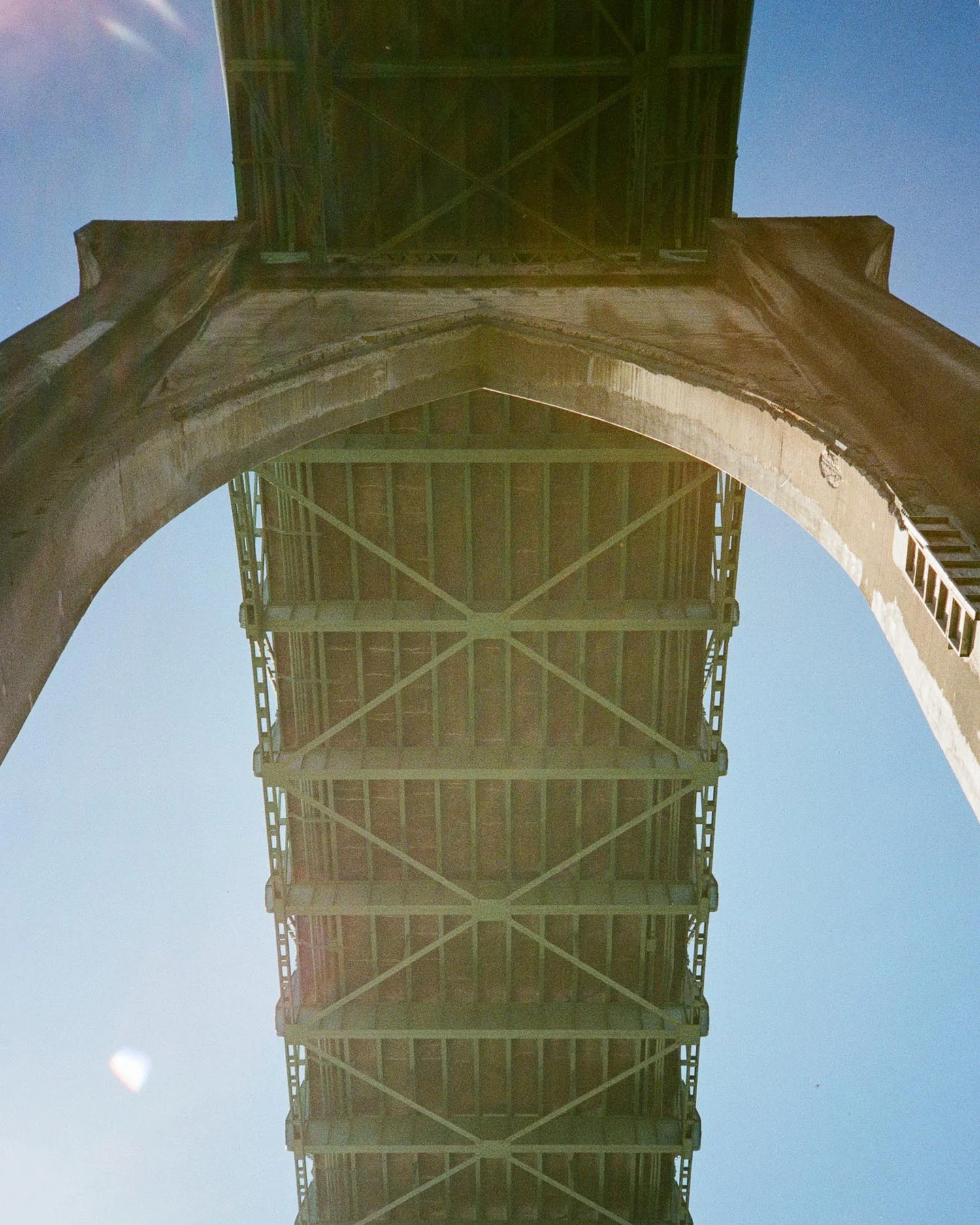 Photo of the underside of St. Johns Bridge from Cathedral Park, Portland, OR