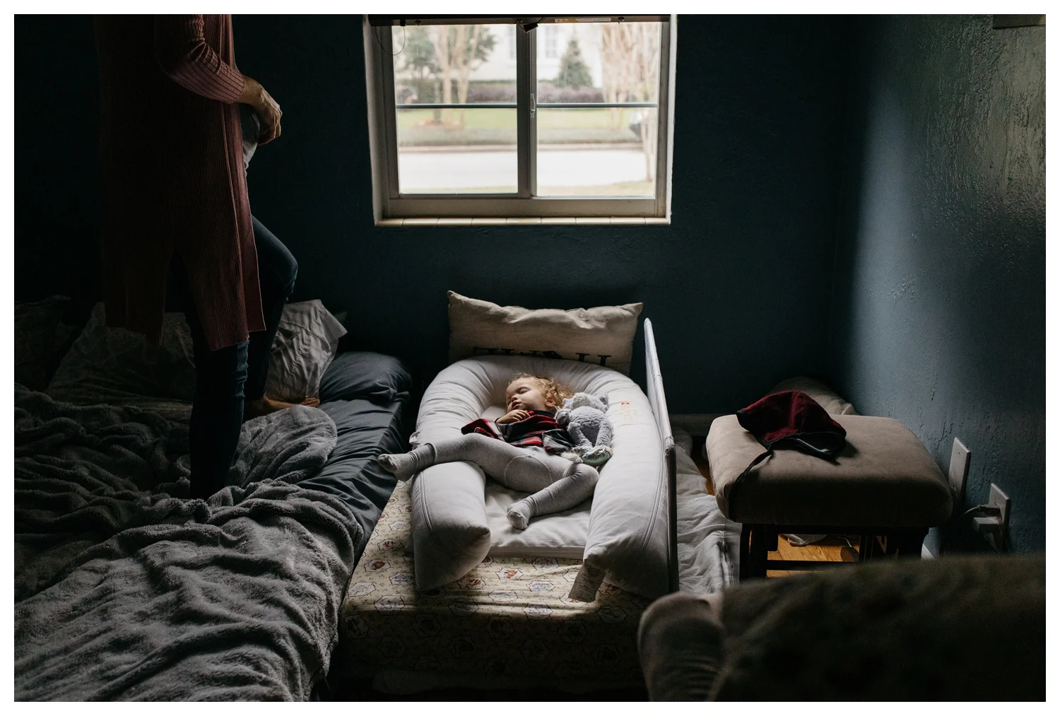 Toddler Asleep in Dockatot Next to Bed Orlando Documentary Photographer.jpg