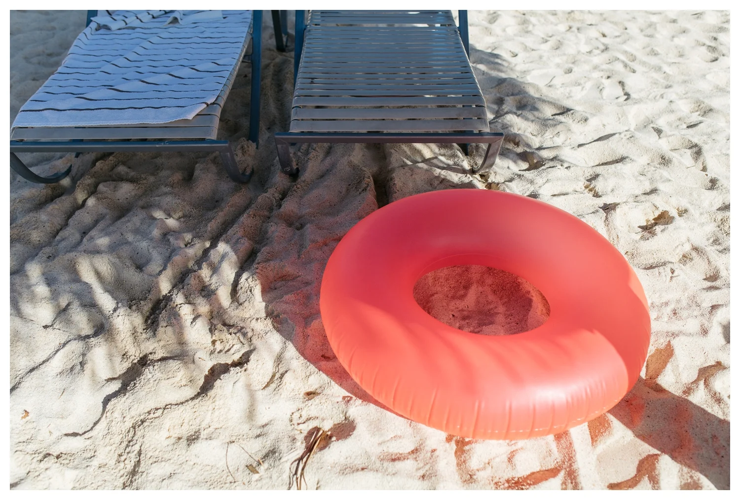 Pink Pool Float in the Sand at Aruba Hilton.jpg