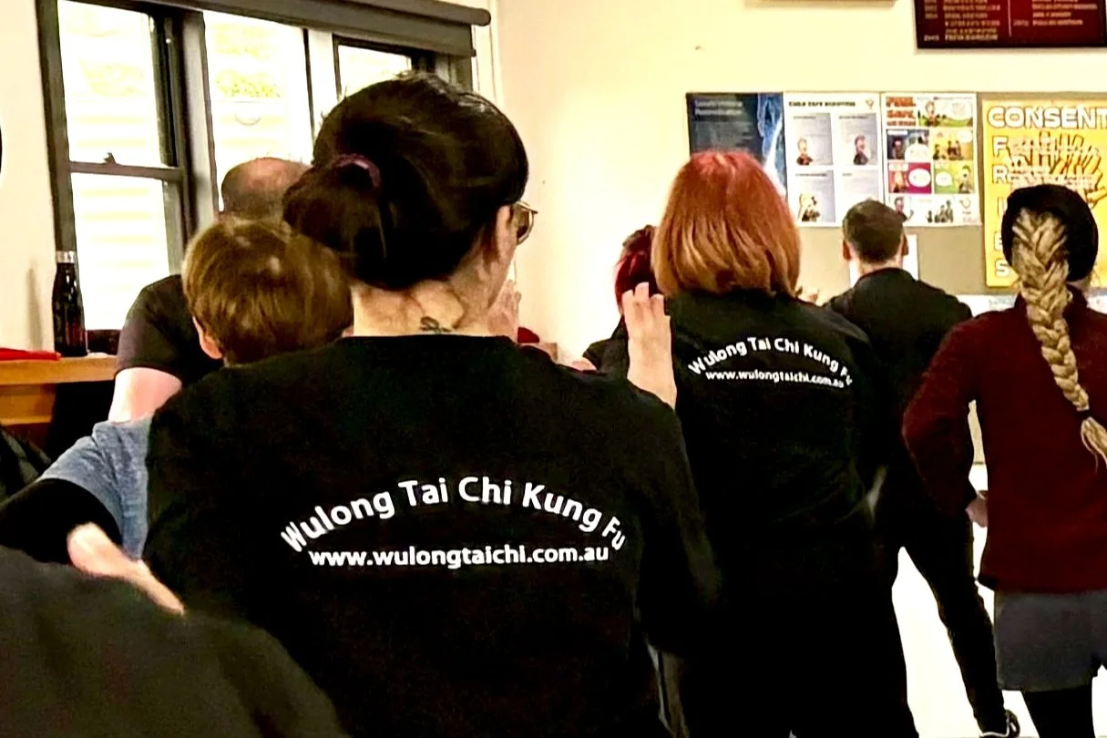 Wulong students practice tai chi