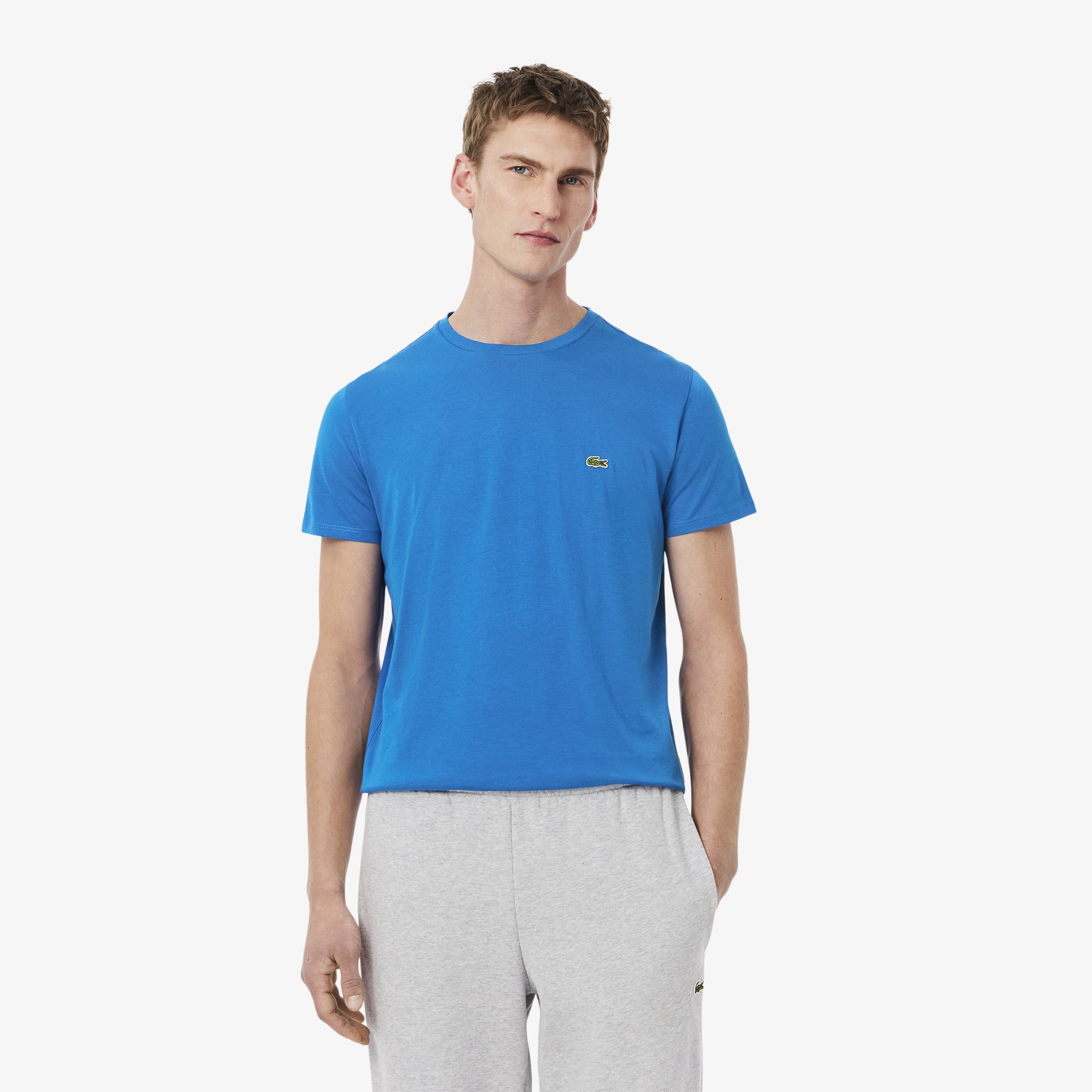 Full View of Model in Lacoste Premium Cotton T Shirt in Strong Blue