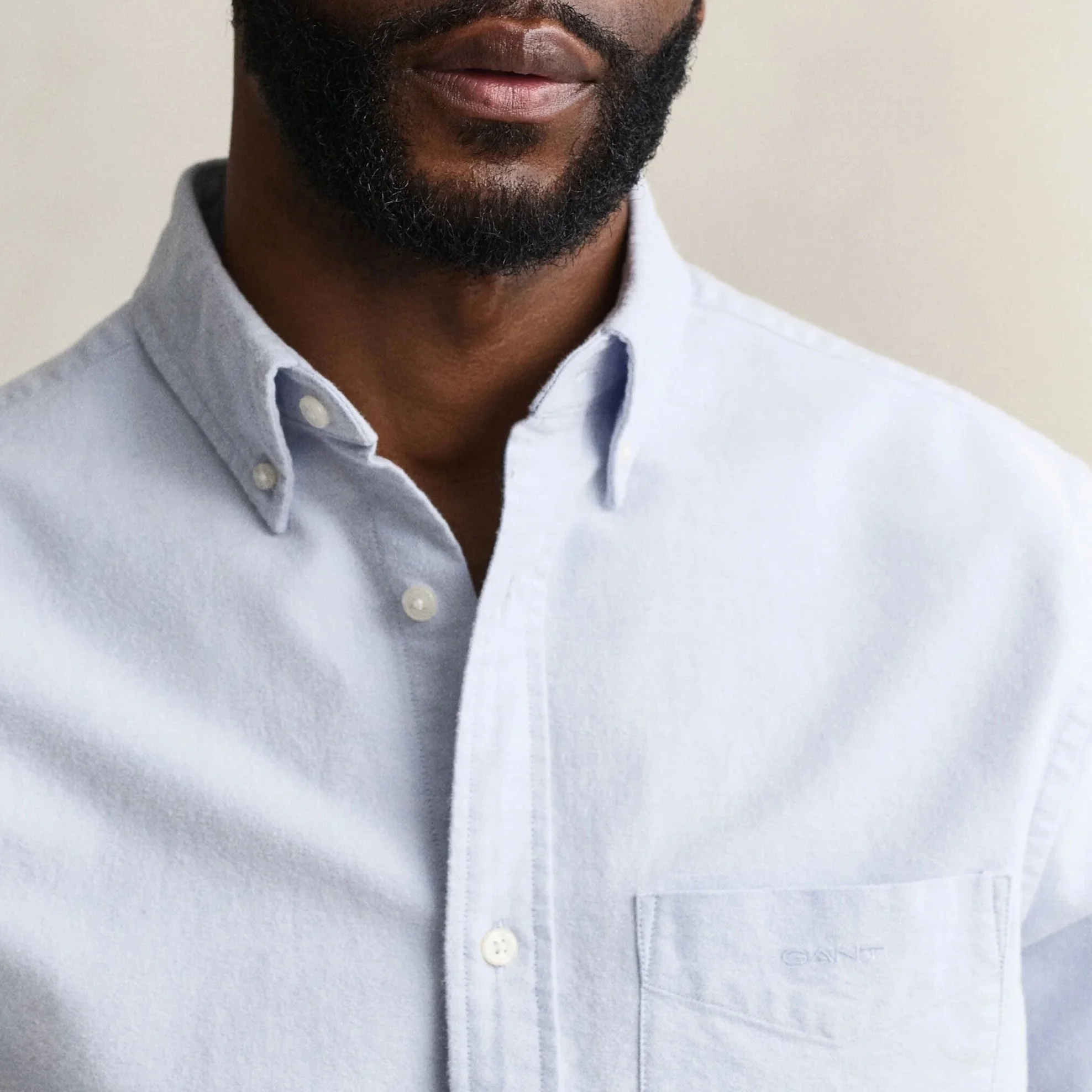 Close View of Model in GANT Regular Fit Brushed Cotton Oxford Shirt in Clear Sky Blue