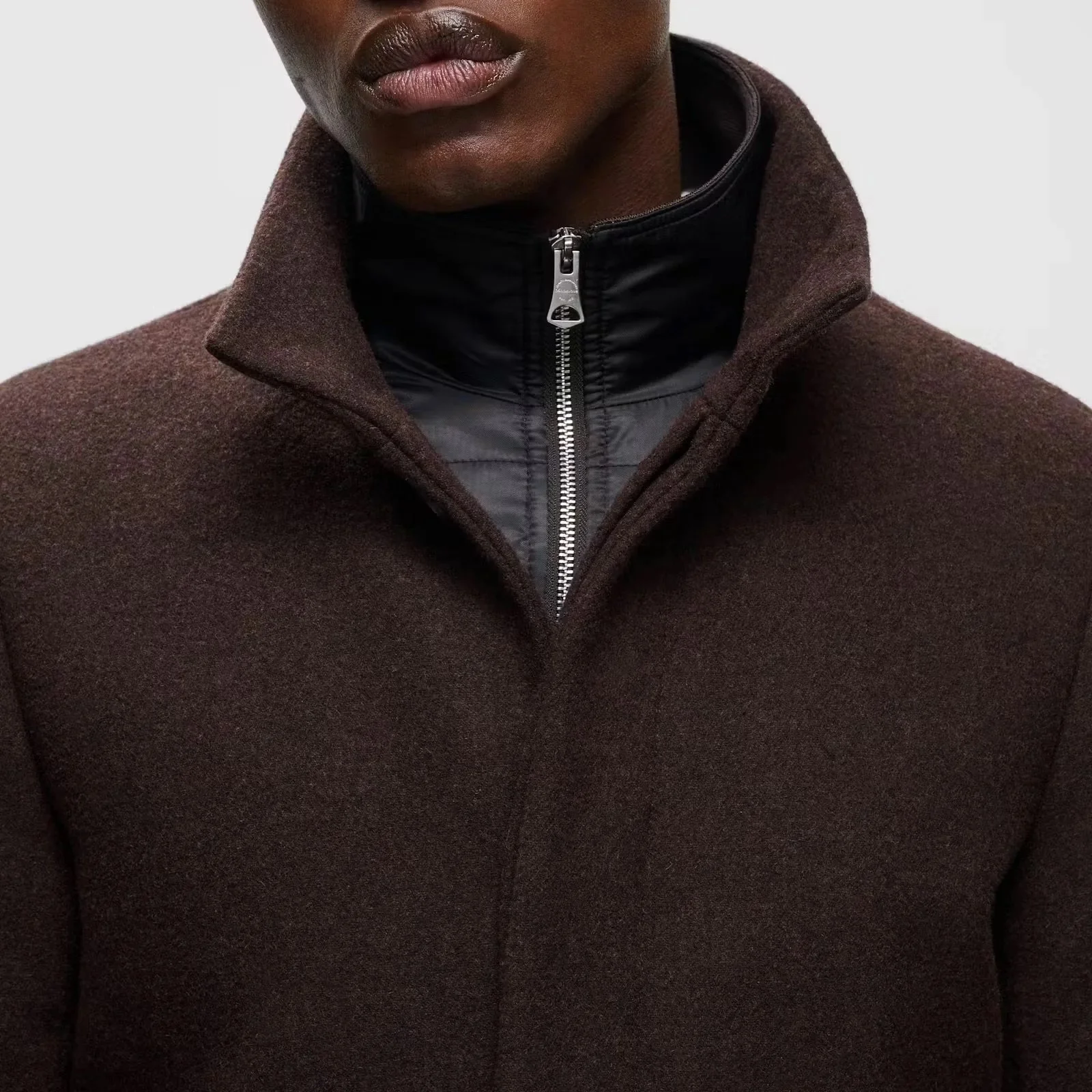 Close View of Model in Matinique Slim Fit Funnel Neck Coat in Espresso Brown