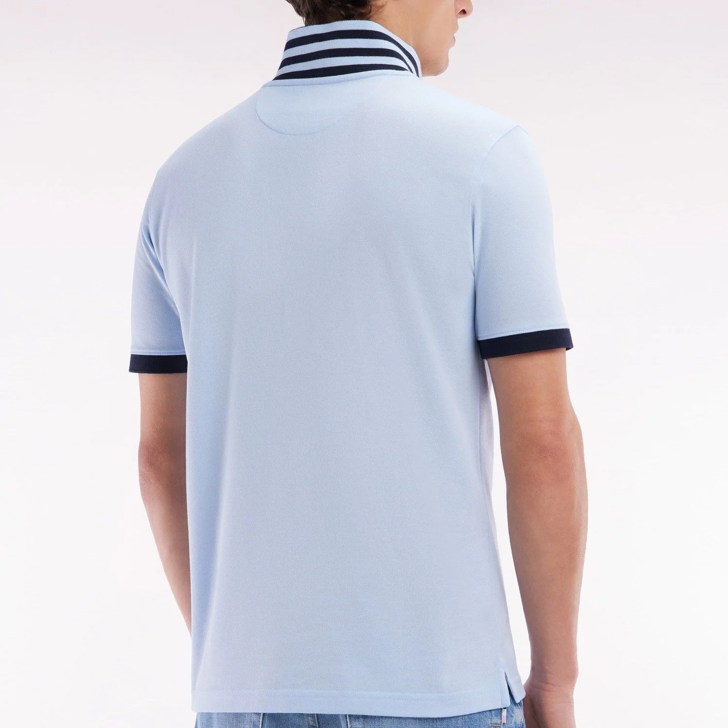 Back View of Model in Eden Park Contrast Collar Polo in Light Blue and Navy