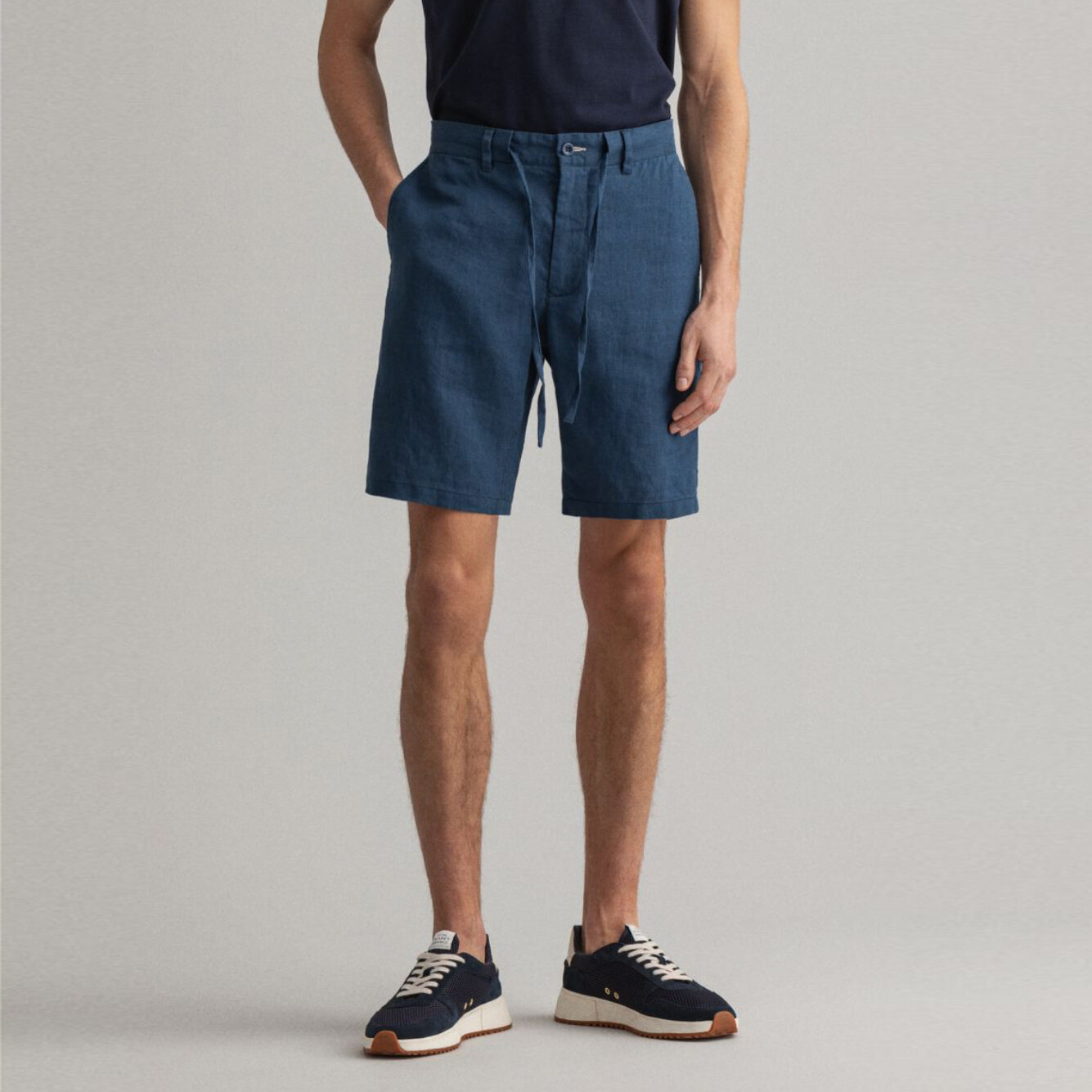 Front view of model wearing GANT Relaxed-Fit Linen Drawstring Shorts in Navy (Copy)