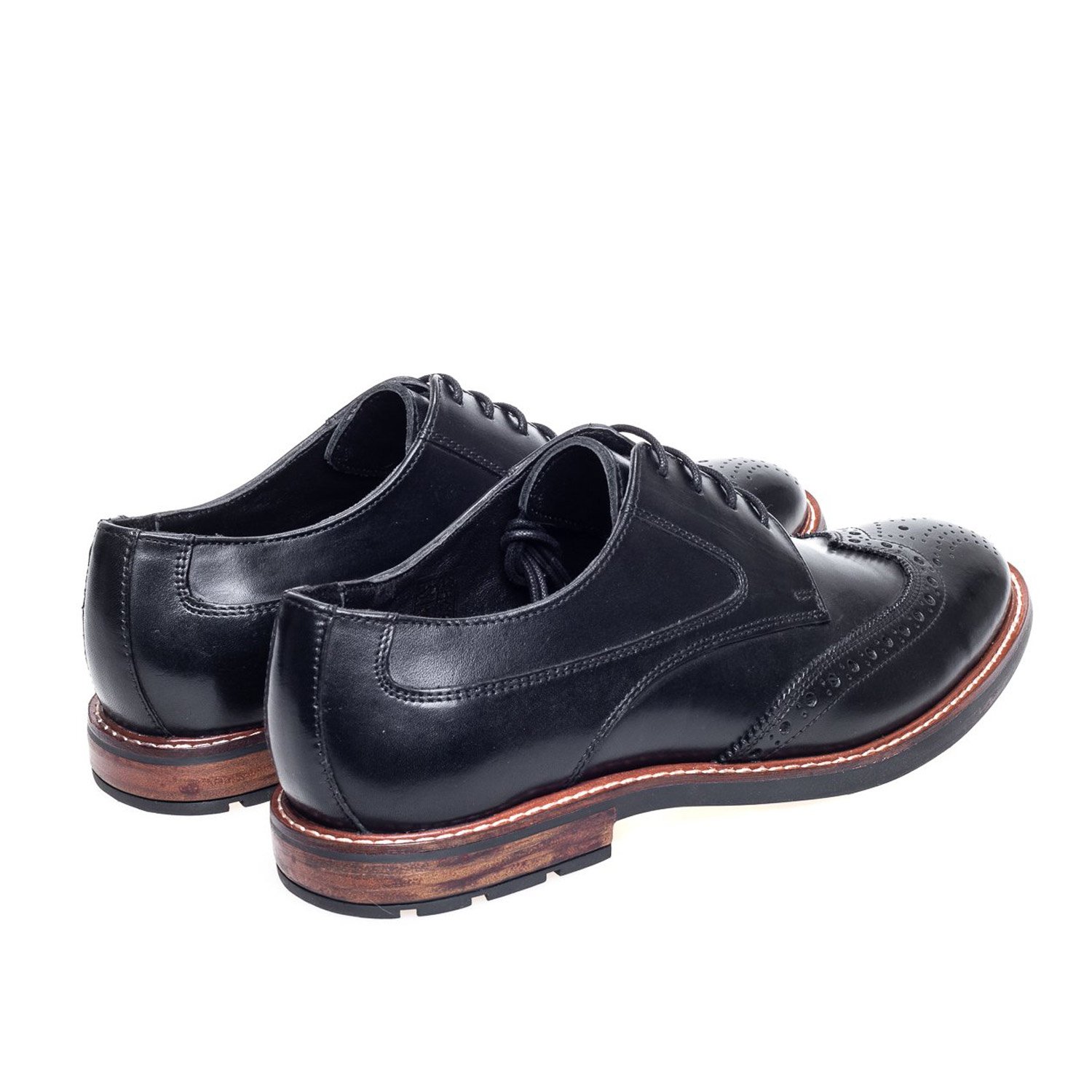 Side heel view of John White Leo Brogue in Black