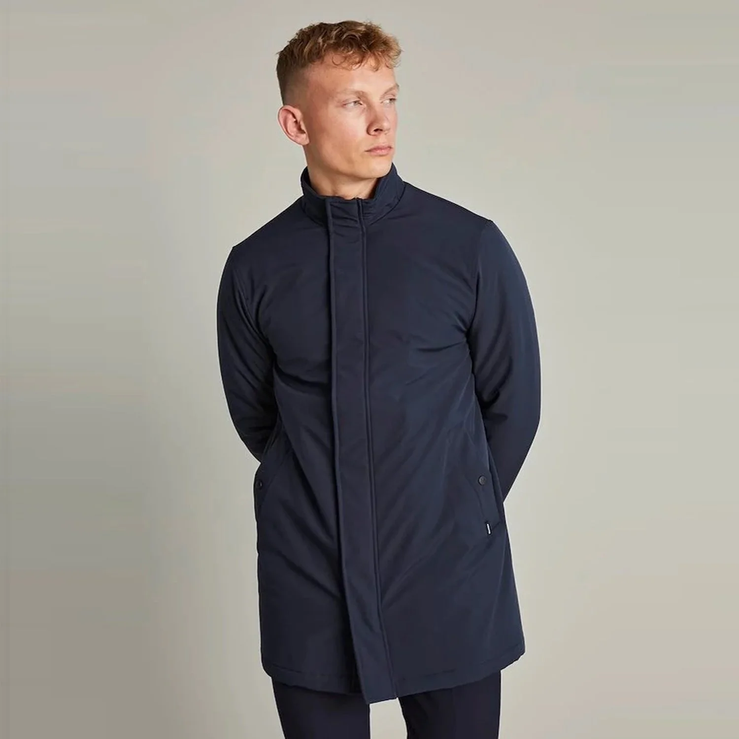Front view of model wearing Matinique Raincoat in Navy