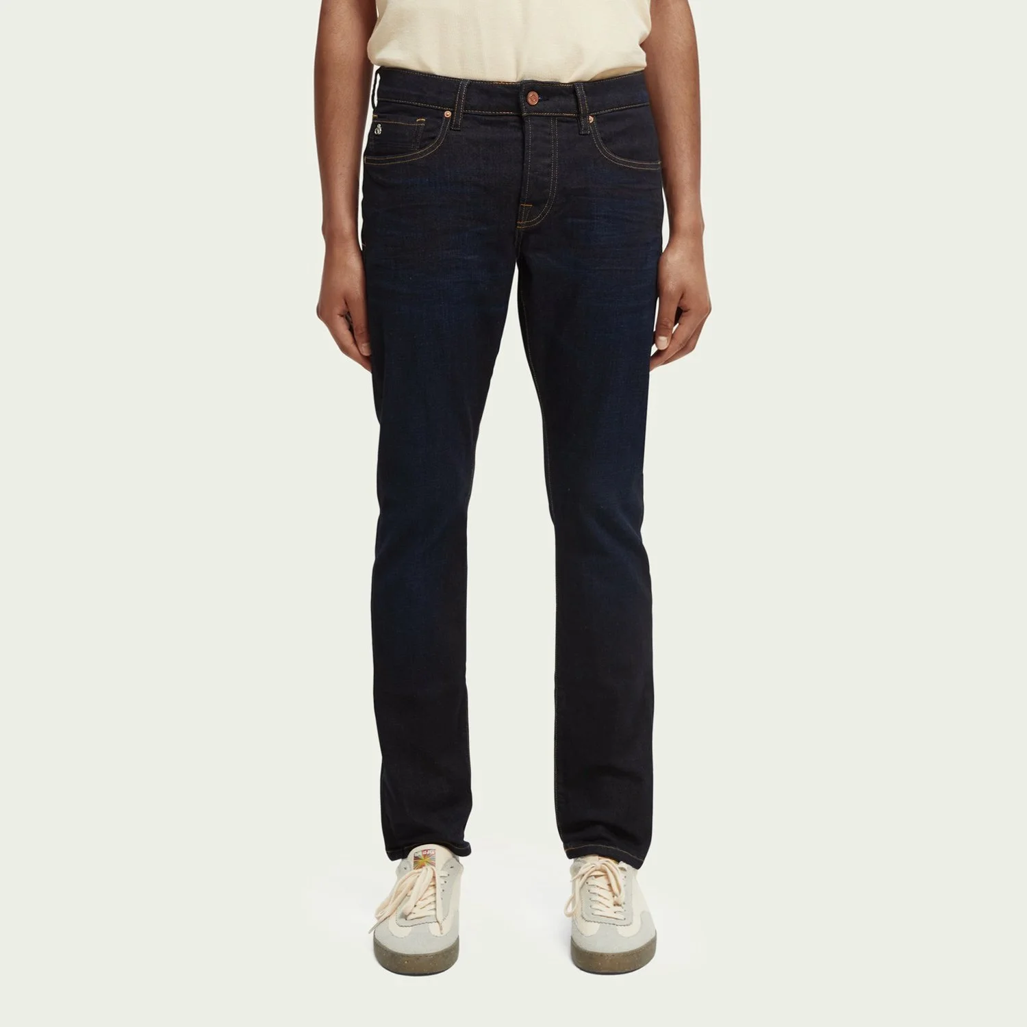 Model wearing Scotch & Soda Slim-Fit Jean in Dark Blue