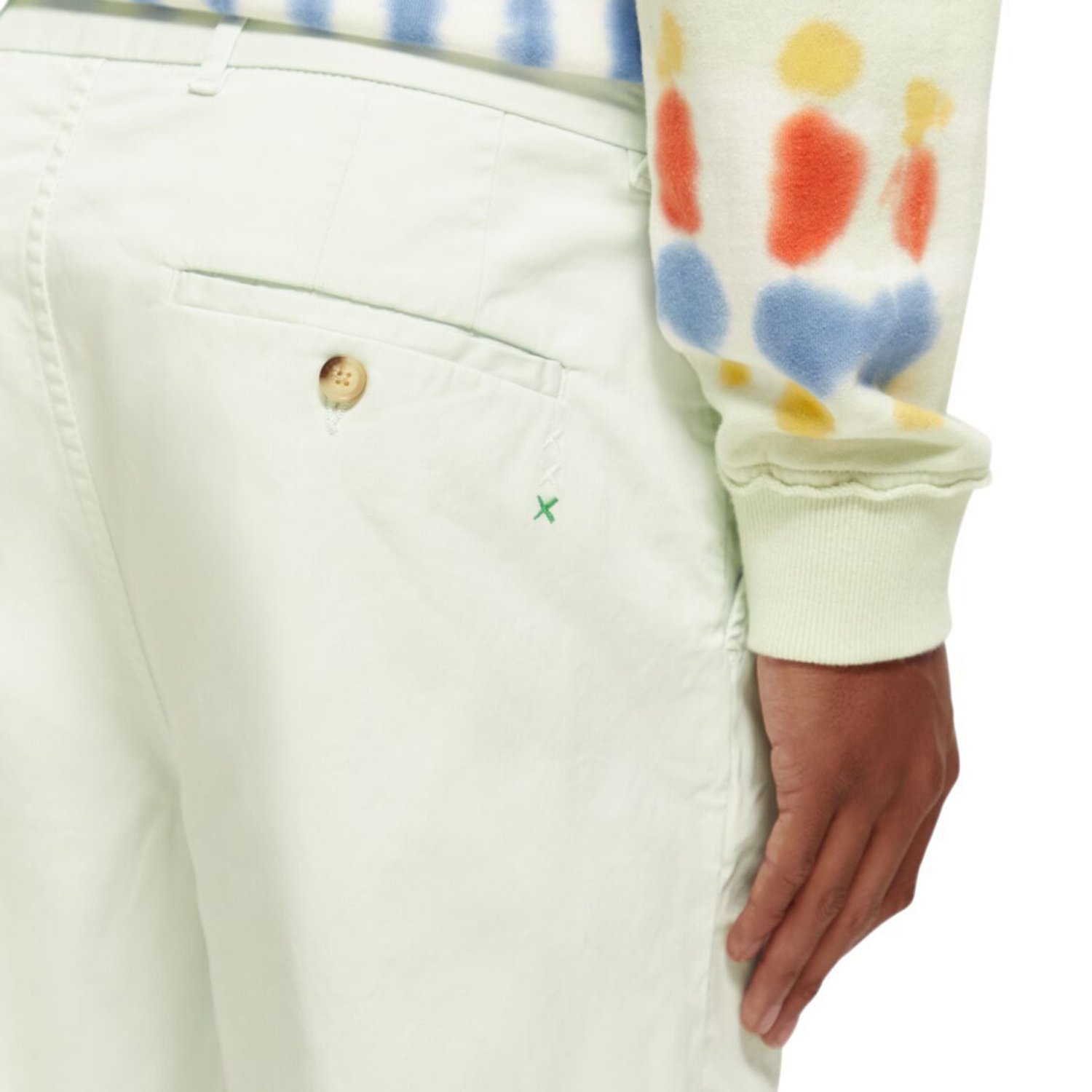 Close-up of model wearing Scotch & Soda Chino Shorts in Mint