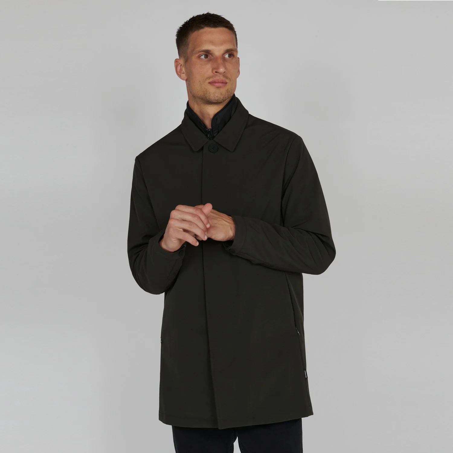 Front view of model wearing Matinique Philman Coat in Olive