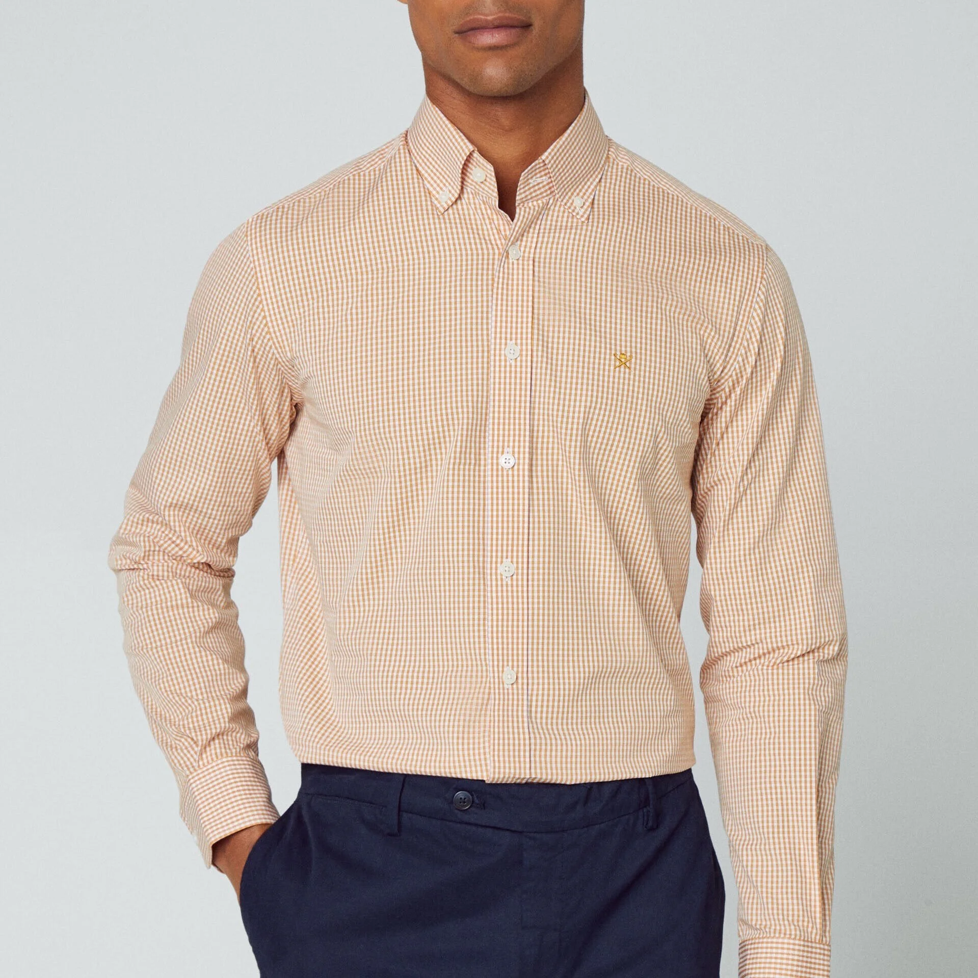 Full view of Model in Hackett Mini Gingham Shirt in Orange