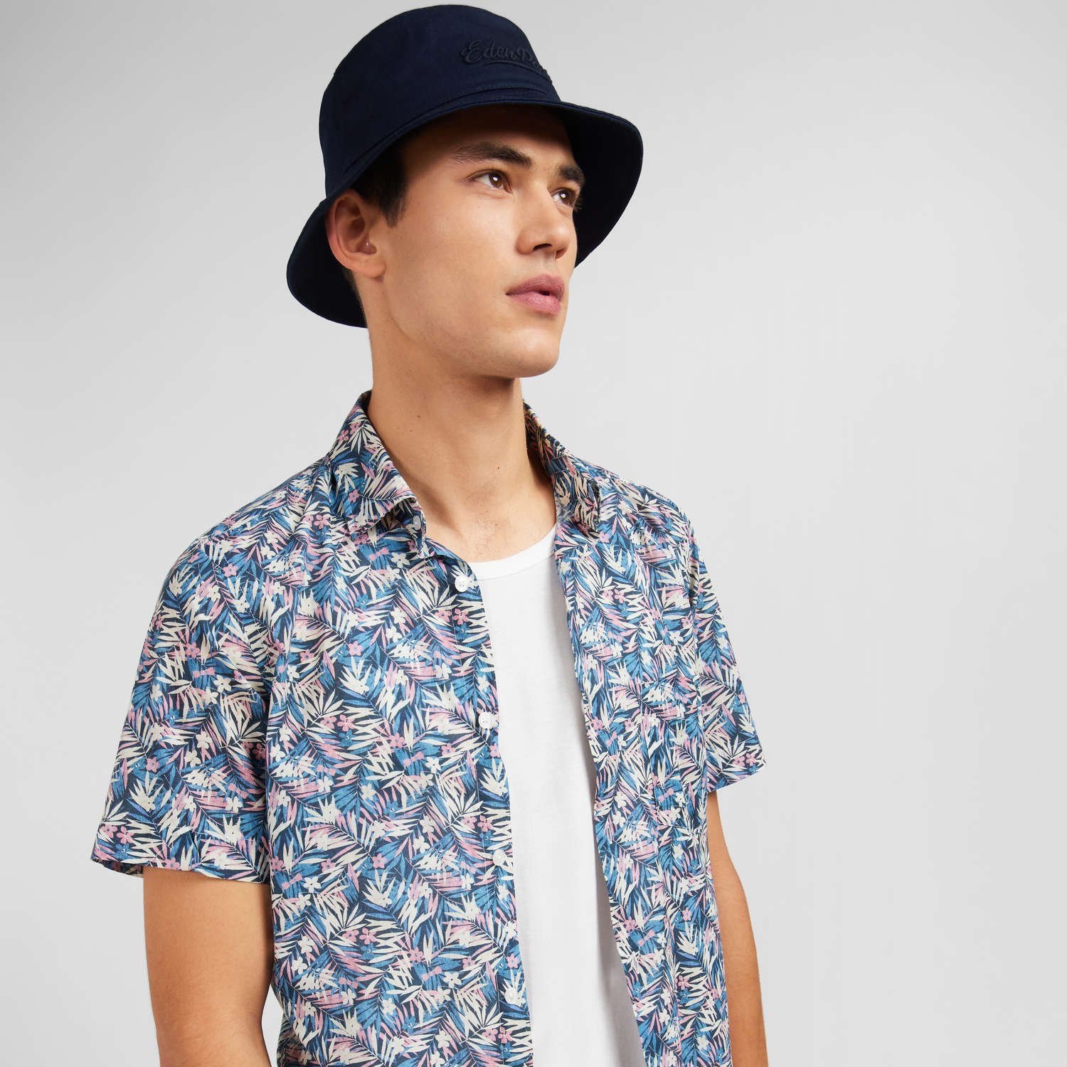 Close View of Model in Eden Park Short Sleeve Slim-Fit Pattern Shirt in White Blue Pink