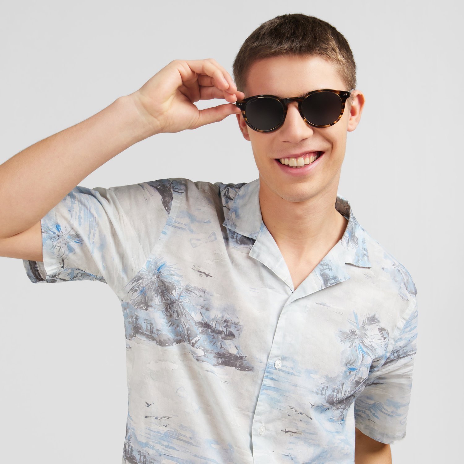 Close View of Model in Eden Park Short Sleeve Slim Fit Pattern Shirt in White Blue