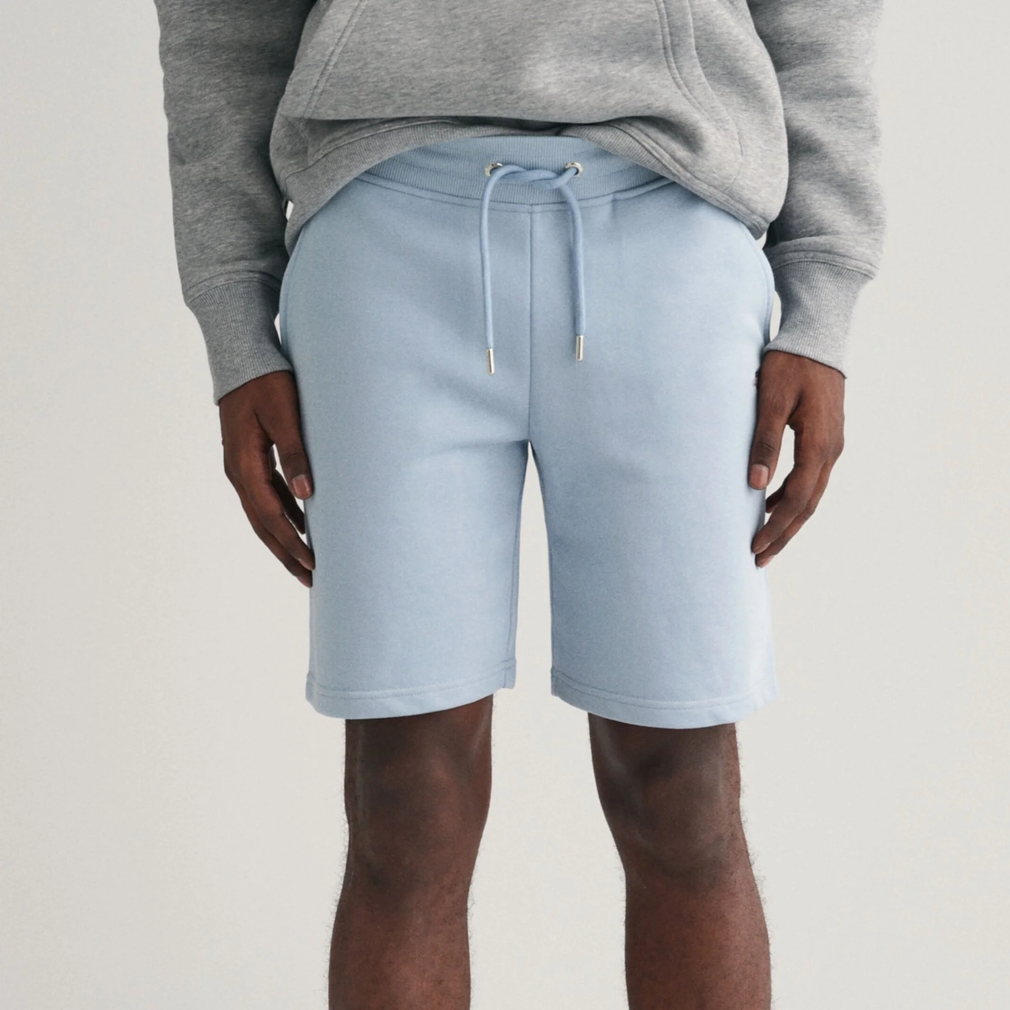 Close View of Model in GANT Sweat Shorts in Light Blue