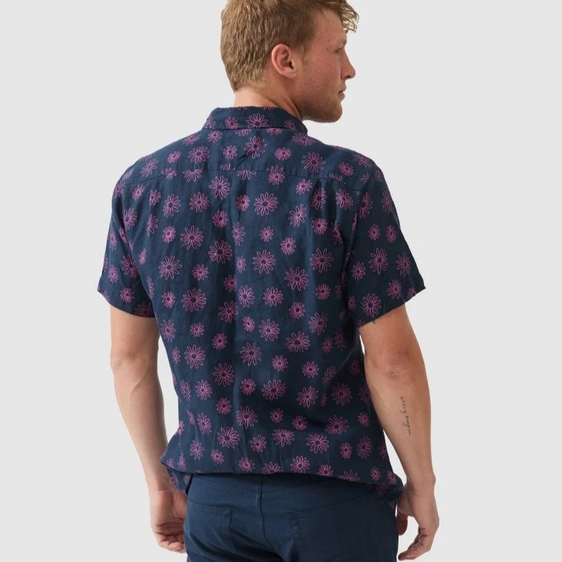 Rear View of Model in Rodd & Gunn Slim Fit Linen Short Sleeve Shirt in Navy and Pink