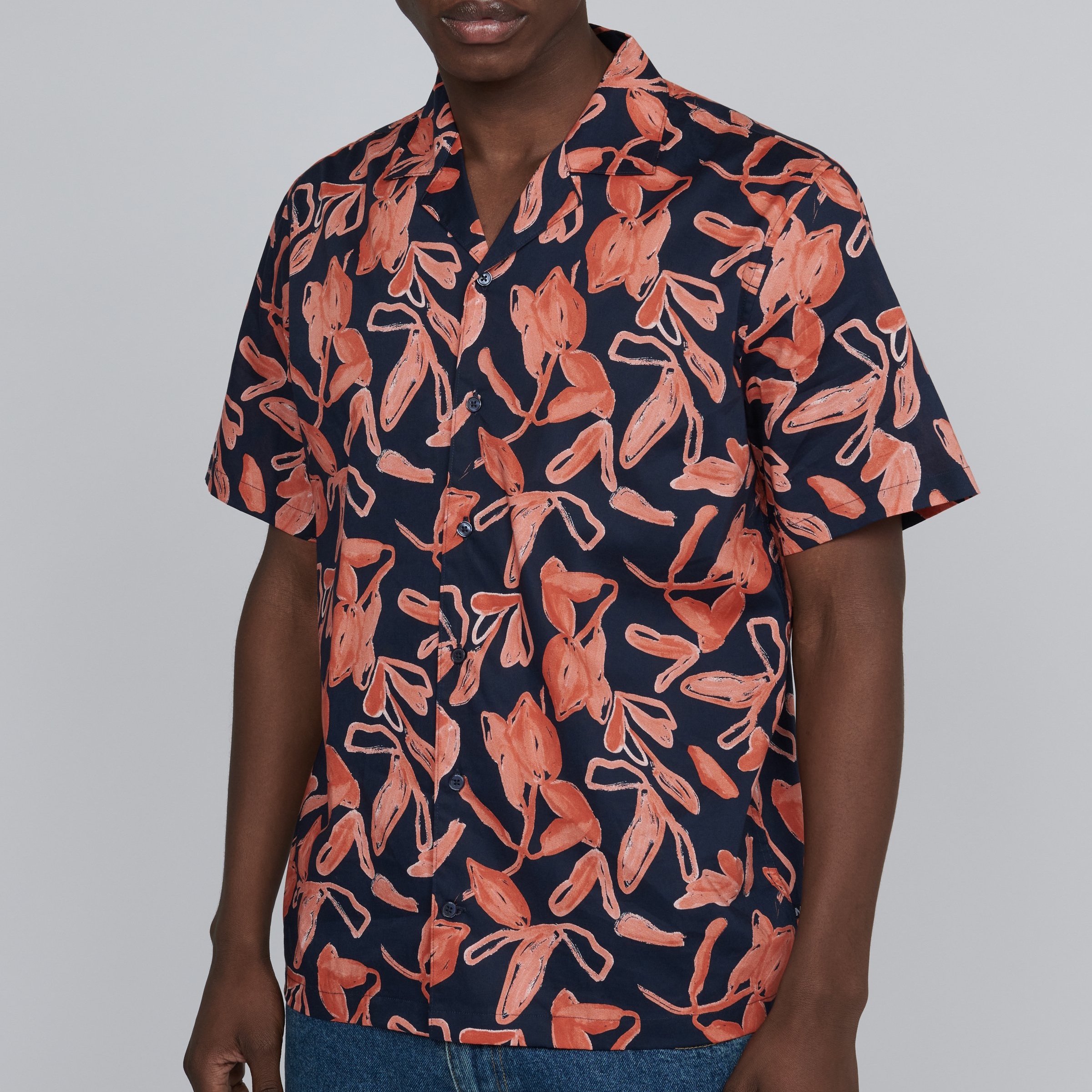Full View of Model in Matinique Pattern Short Sleeve Shirt in Navy and Orange