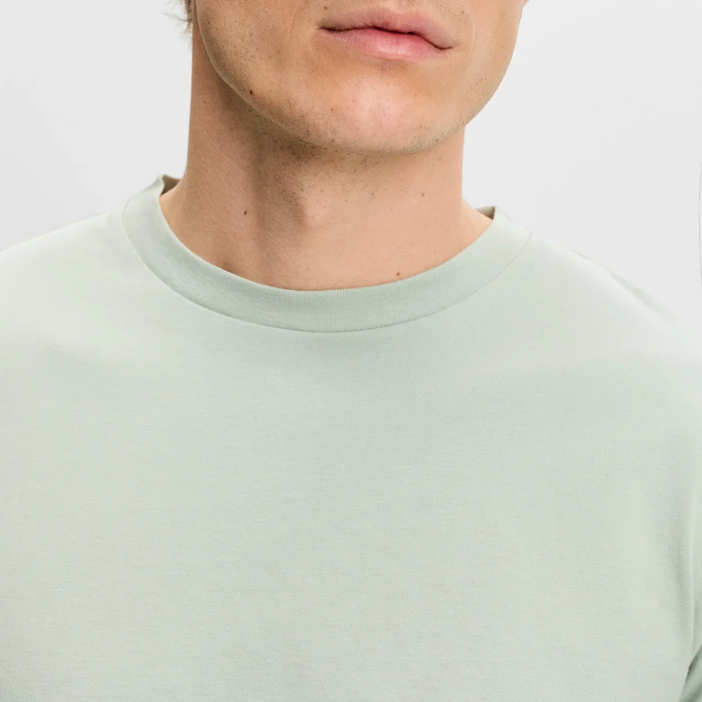Close View of J Lindeberg Premium T Shirt in Soft Green