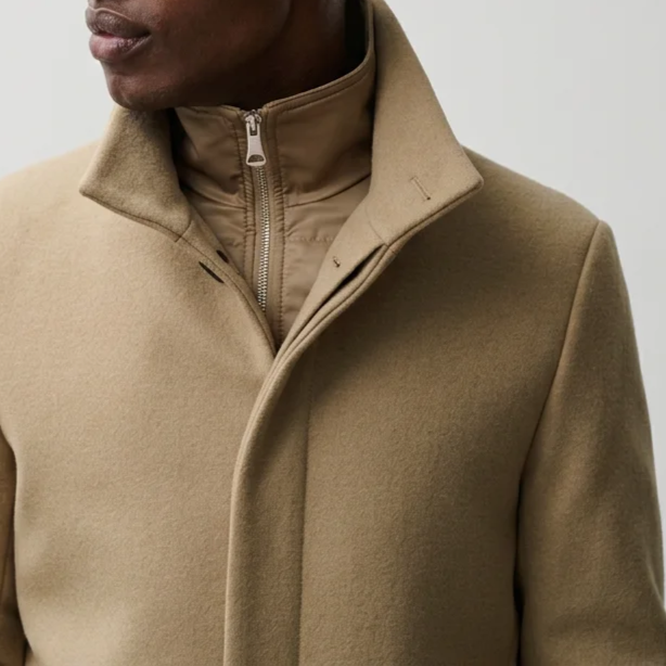 Close View of Model in Matinique Slim Fit Funnel Neck Coat in Kelp Camel