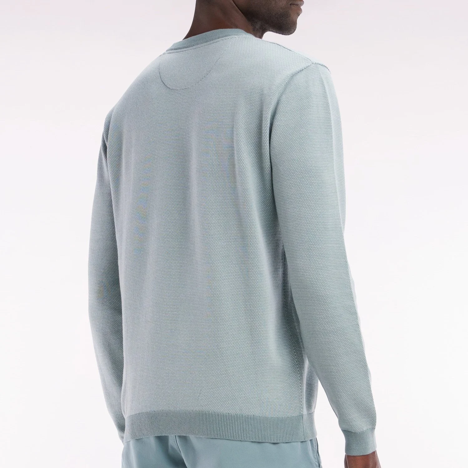 Side View of Model in Eden Park Texture Jumper in Soft Green