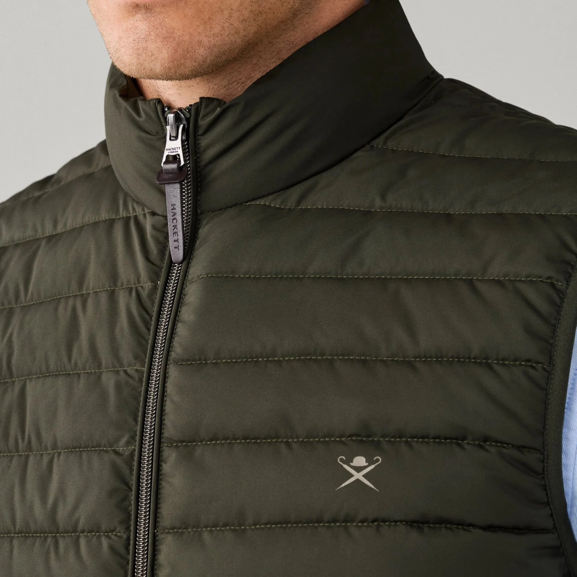 Close View of Model in Hackett Lightweight Gilet in Hunter Green
