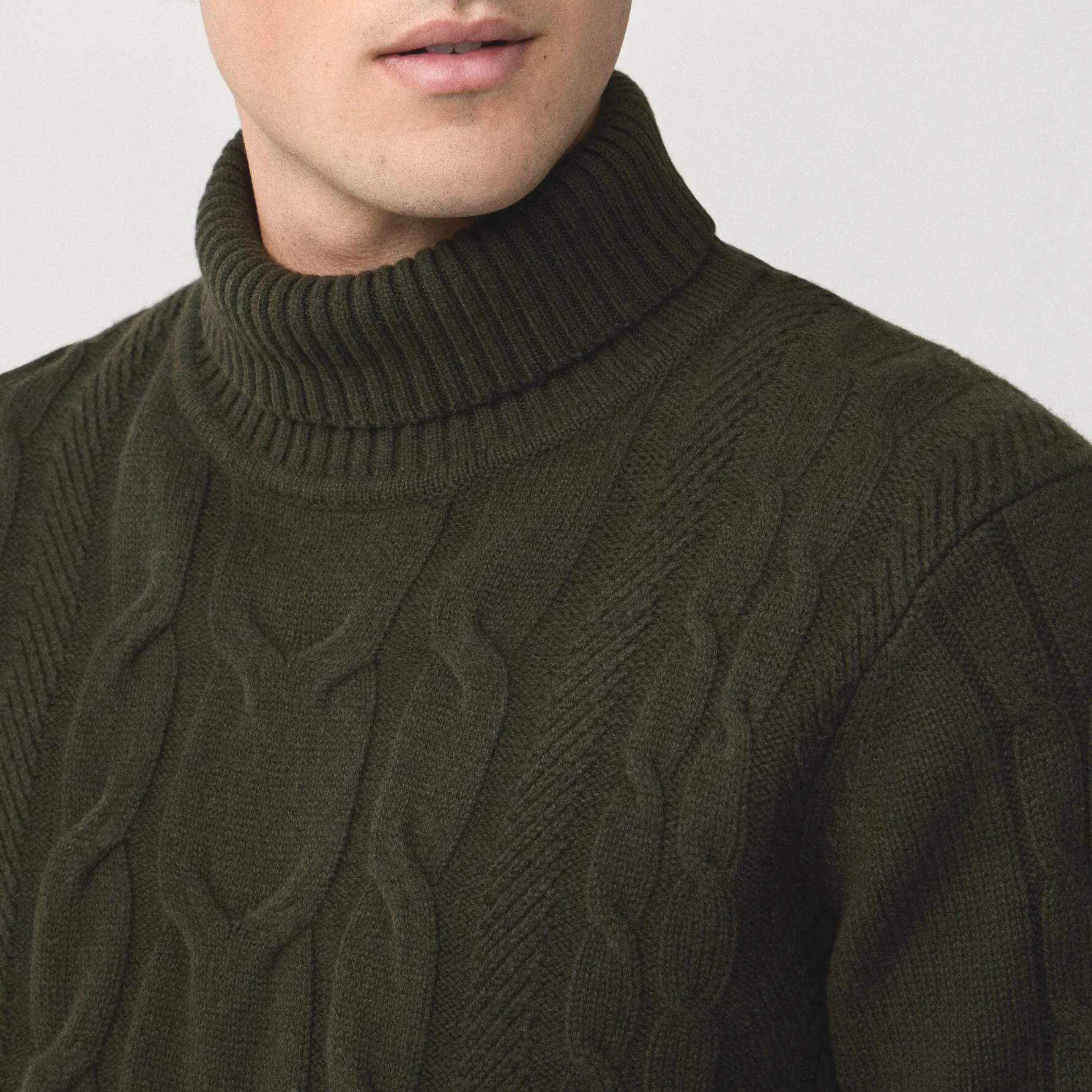 Close Model View of Hackett Luxury Wool and Cashmere Roll Neck Jumper in Dark Green