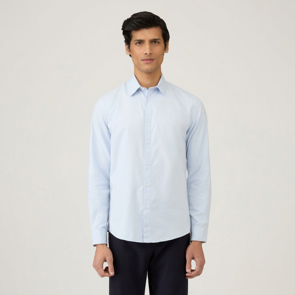 Front View of Model in Sunspel Luxury Oxford Shirt in Light Blue