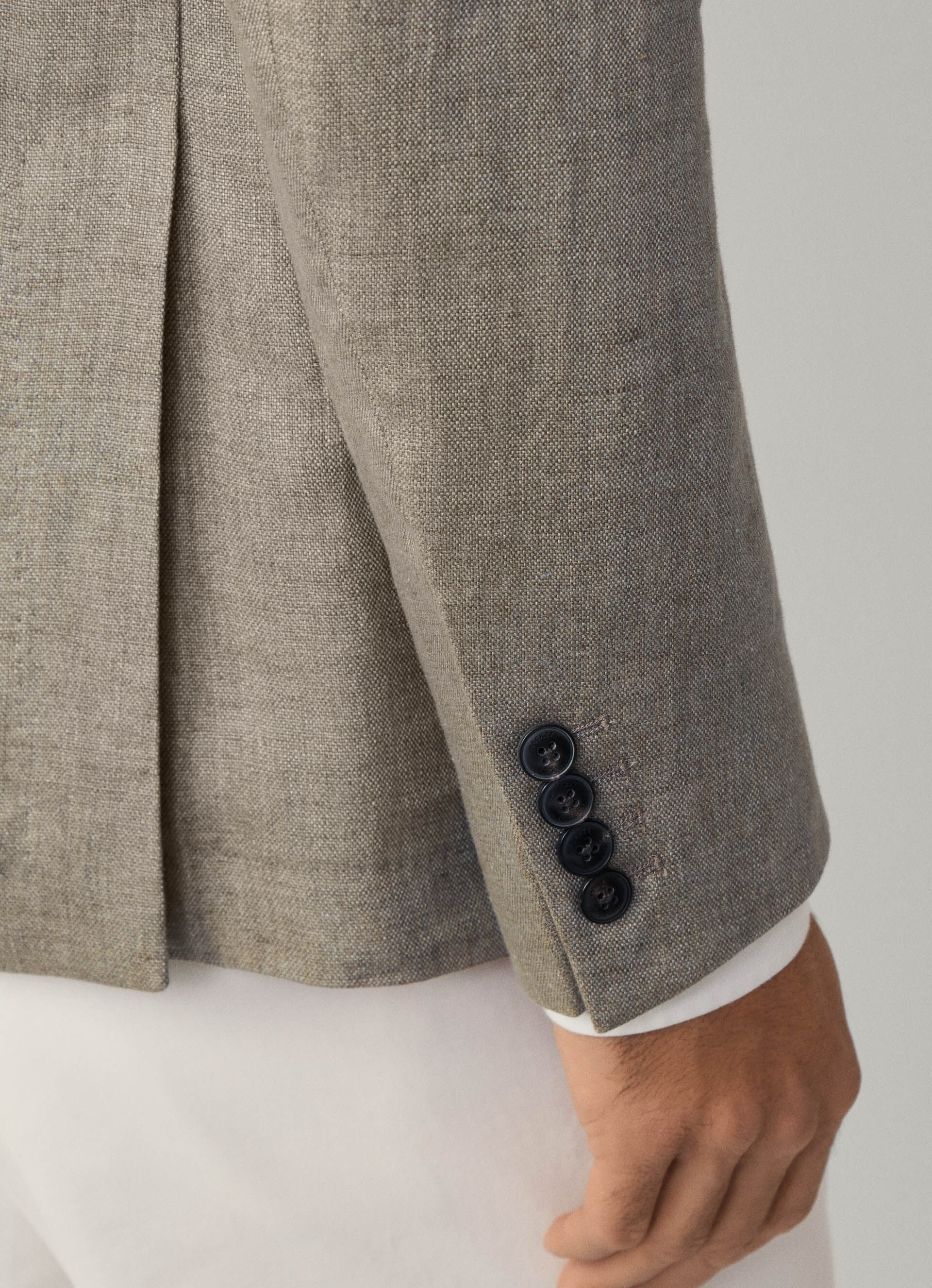Detail View of Model in Hackett Linen Blazer in Light Brown