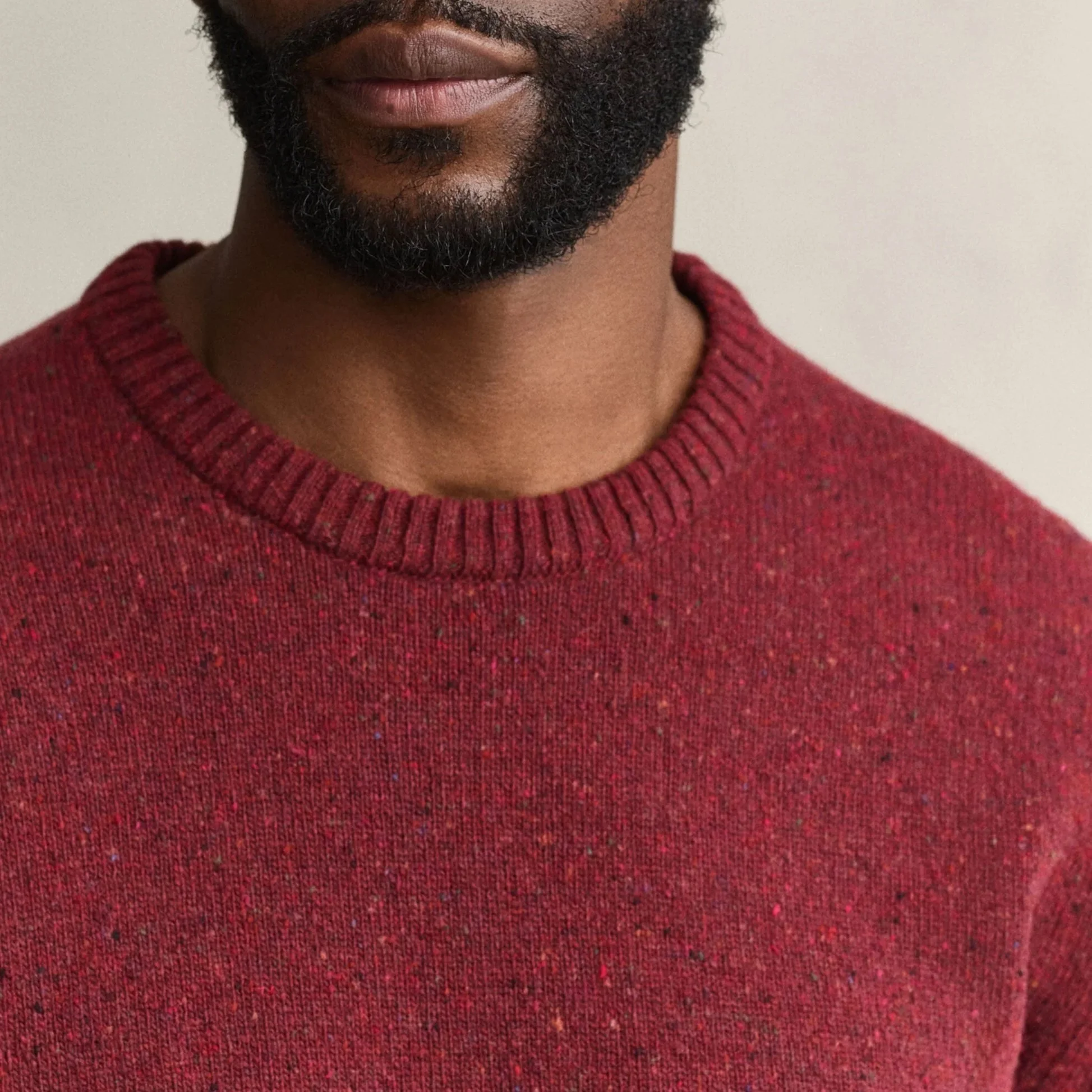 Close View of Model in GANT Wool Blend Neps Crew Neck in Plumped Red