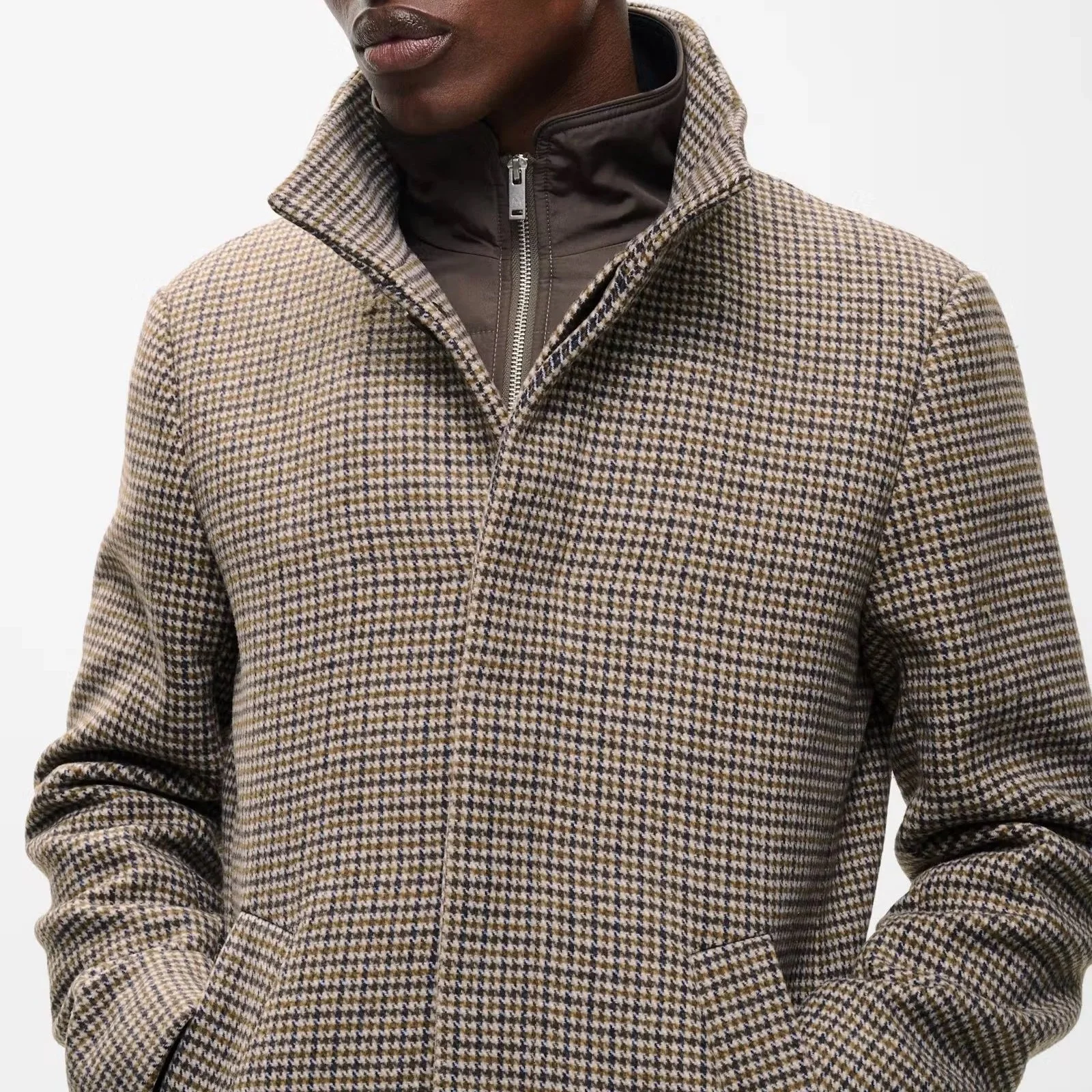 Close View of Model in Matinique Check Slim Fit Funnel Neck Coat in Simply Taupe and Brown