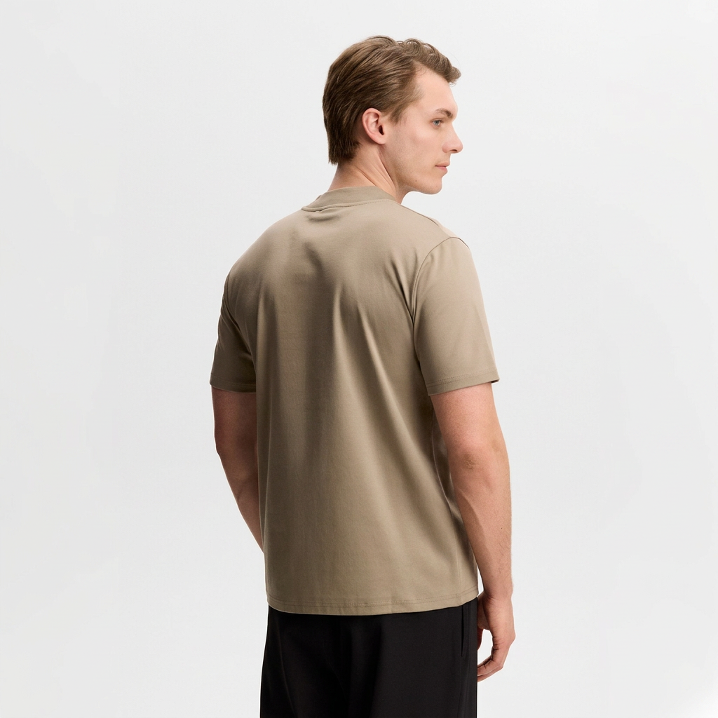 Back View of Model in J Lindeberg Ace High Neck T Shirt in Sand