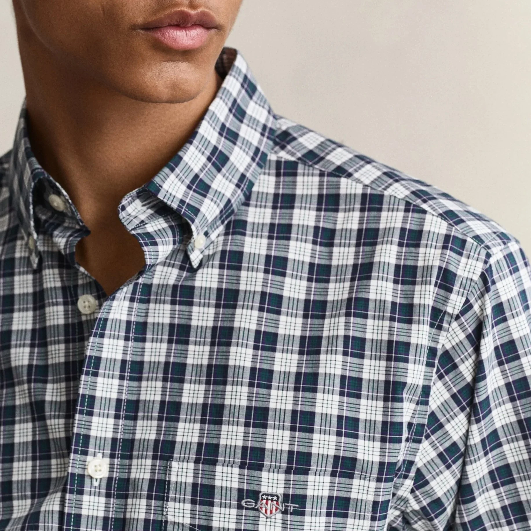 Close View of Model in GANT Regular Fit Poplin Check Shirt in Dark Emerald Green and White