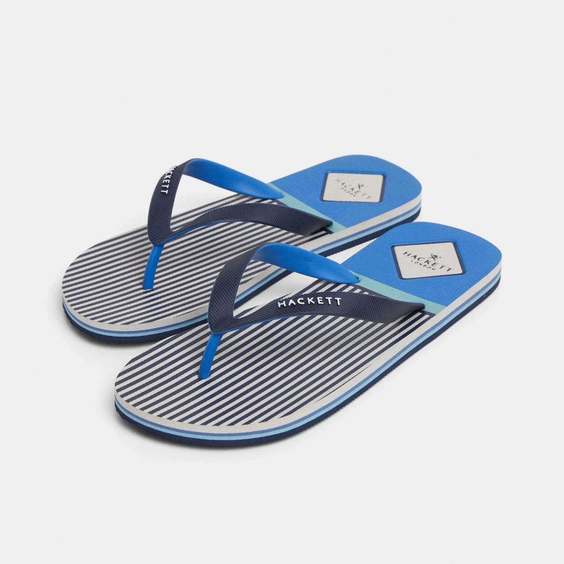 Angled View of Hackett Stripe Flip Flop in Navy and Blue