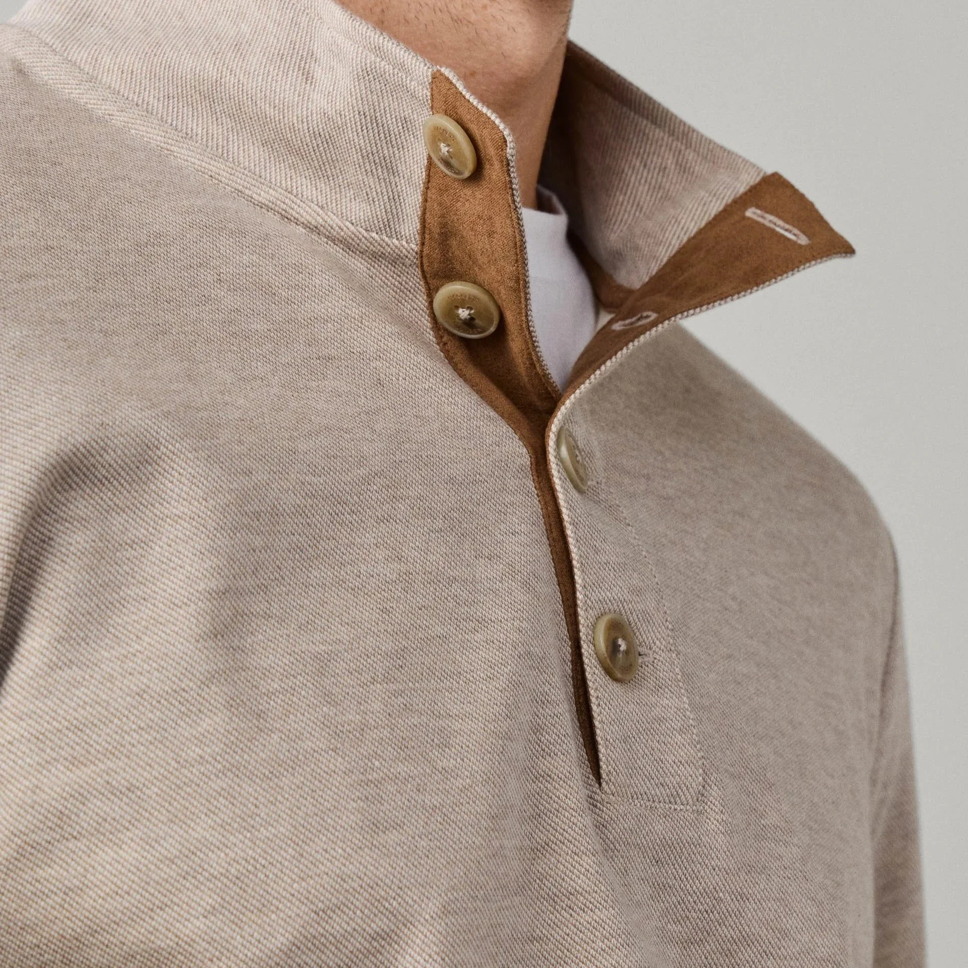 Close View of Model in Hackett Twill Jacquard Half Button Sweatshirt in Natural Beige