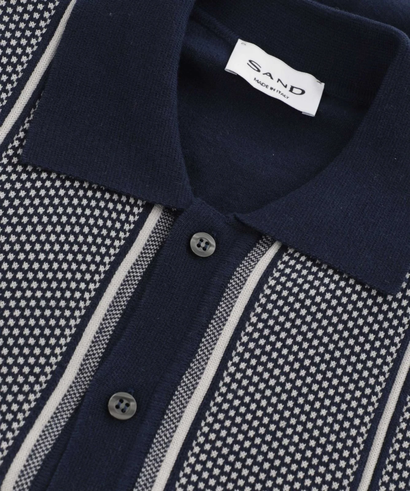 Close View of SAND Copenhagen Luxury Stripe Knitted Button Through Polo in Navy and White