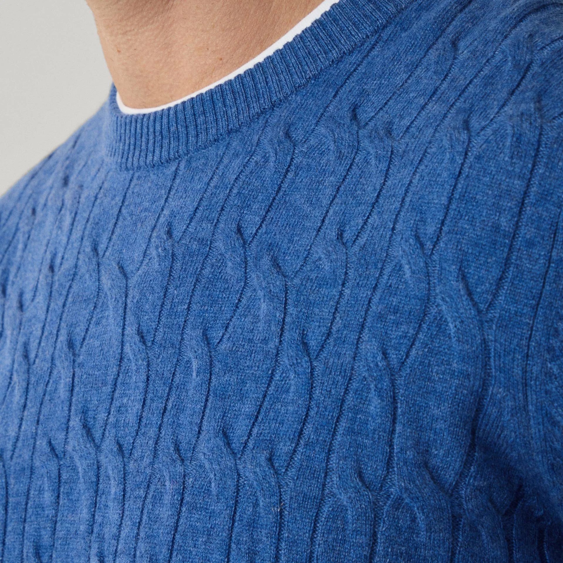 Close Model View of Hackett Lambswool Cable Jumper in Mid Blue