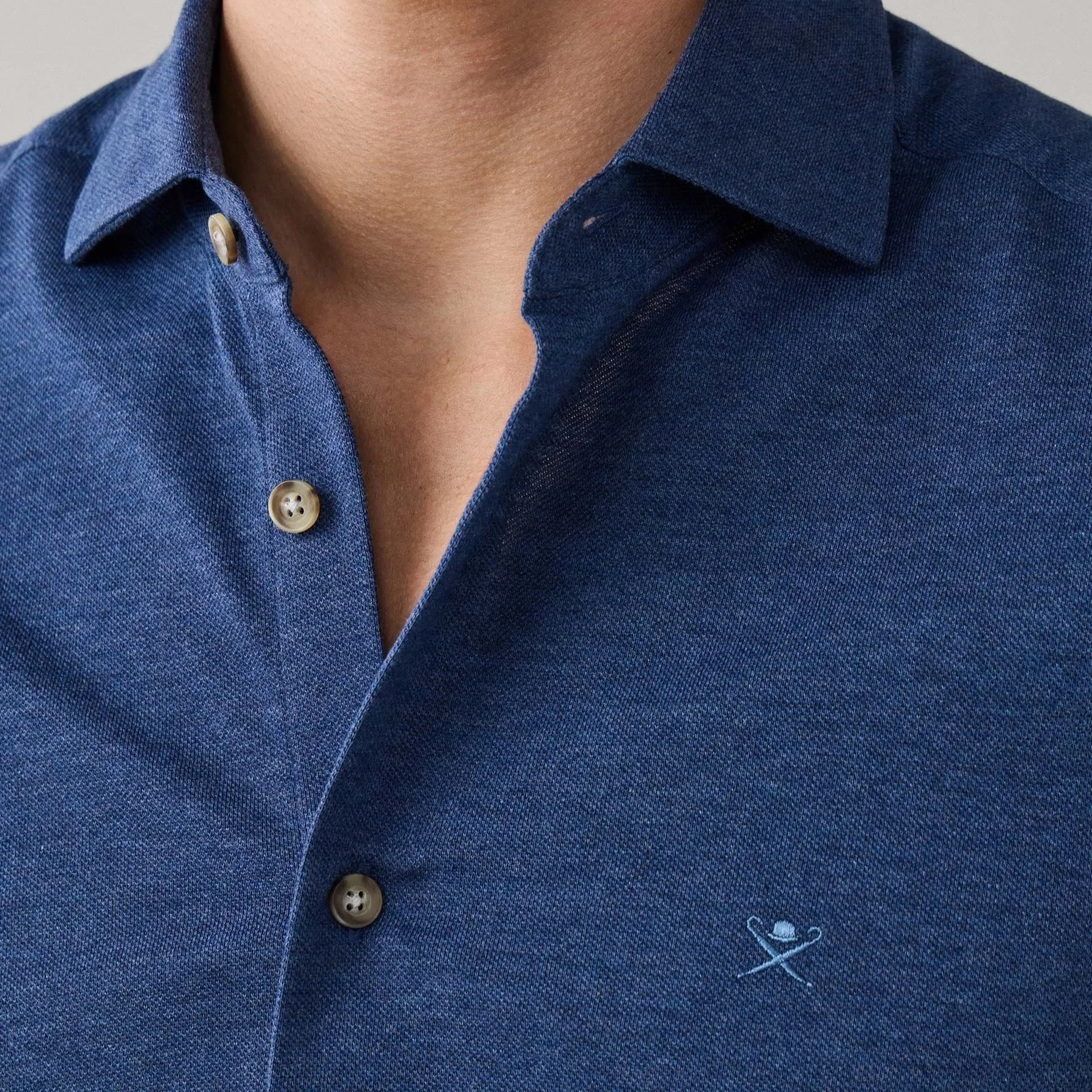 Close View of Model in Hackett Jersey Piqué Shirt in Mid Blue