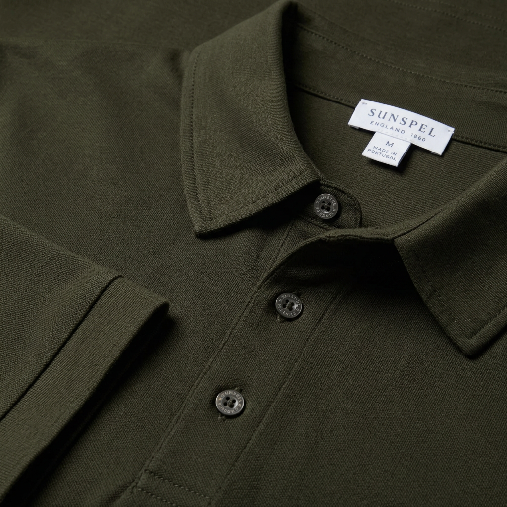 Close View of Sunspel Luxury Long Sleeve Jersey Polo in Anthracite Green | Westdaw Menswear