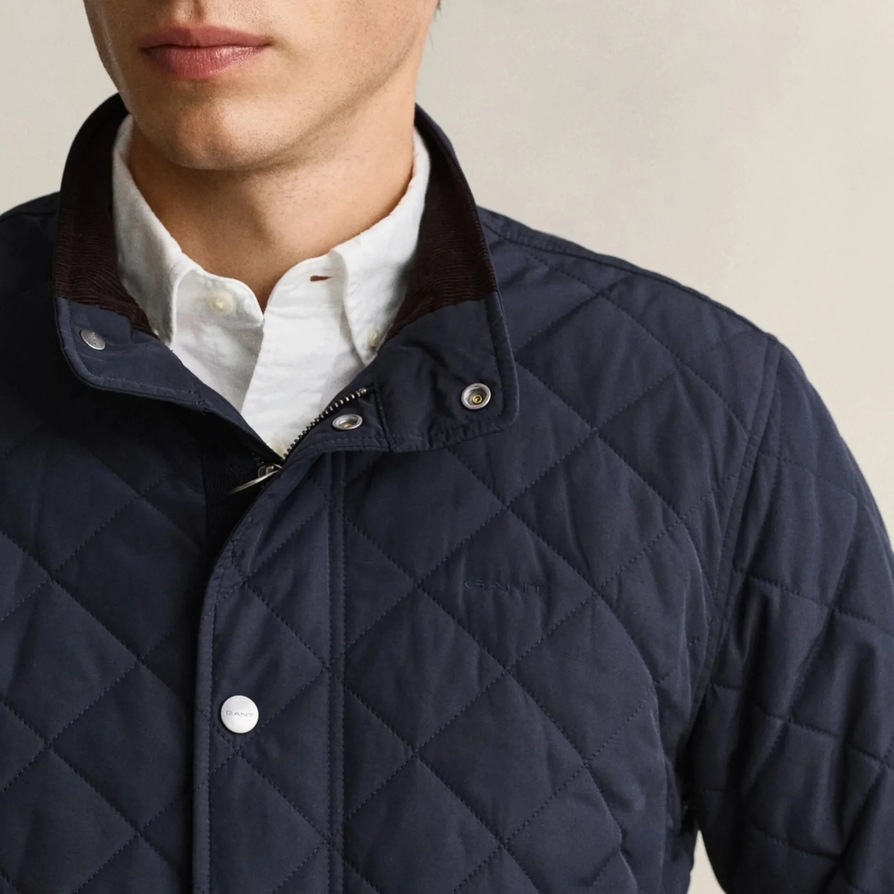 Close View of Model in GANT Quilted Jacket in Evening Blue